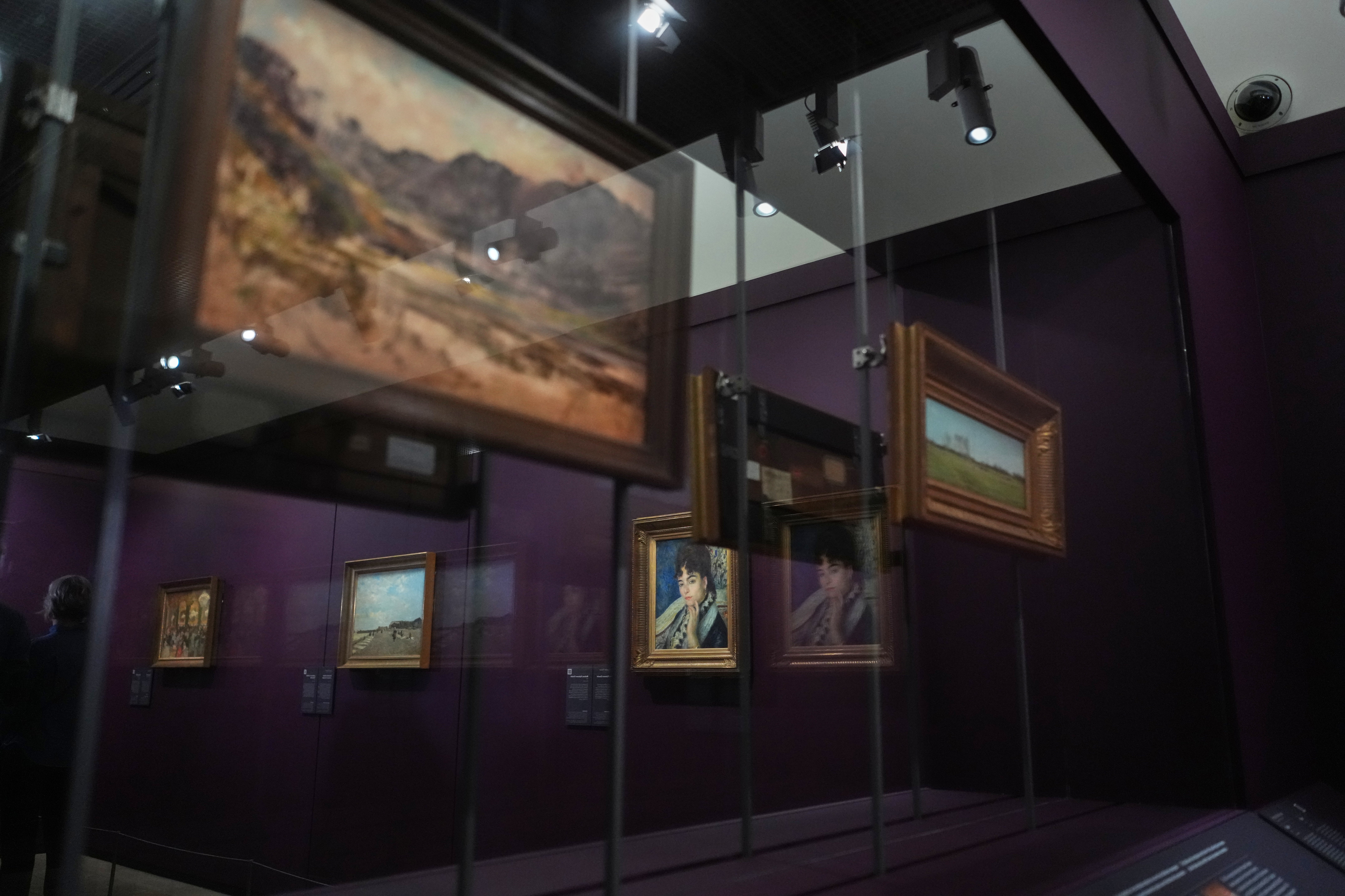 French painter Pierre-Auguste Renoir's painting titled ‘Madame Alphonse Daudet’, center, is on exhibit in the Musée d'Orsay museum's new permanent gallery dedicated to so-called MNR artworks,