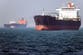 British military says bulk carrier near Qatar caught fire after being struck by projectile