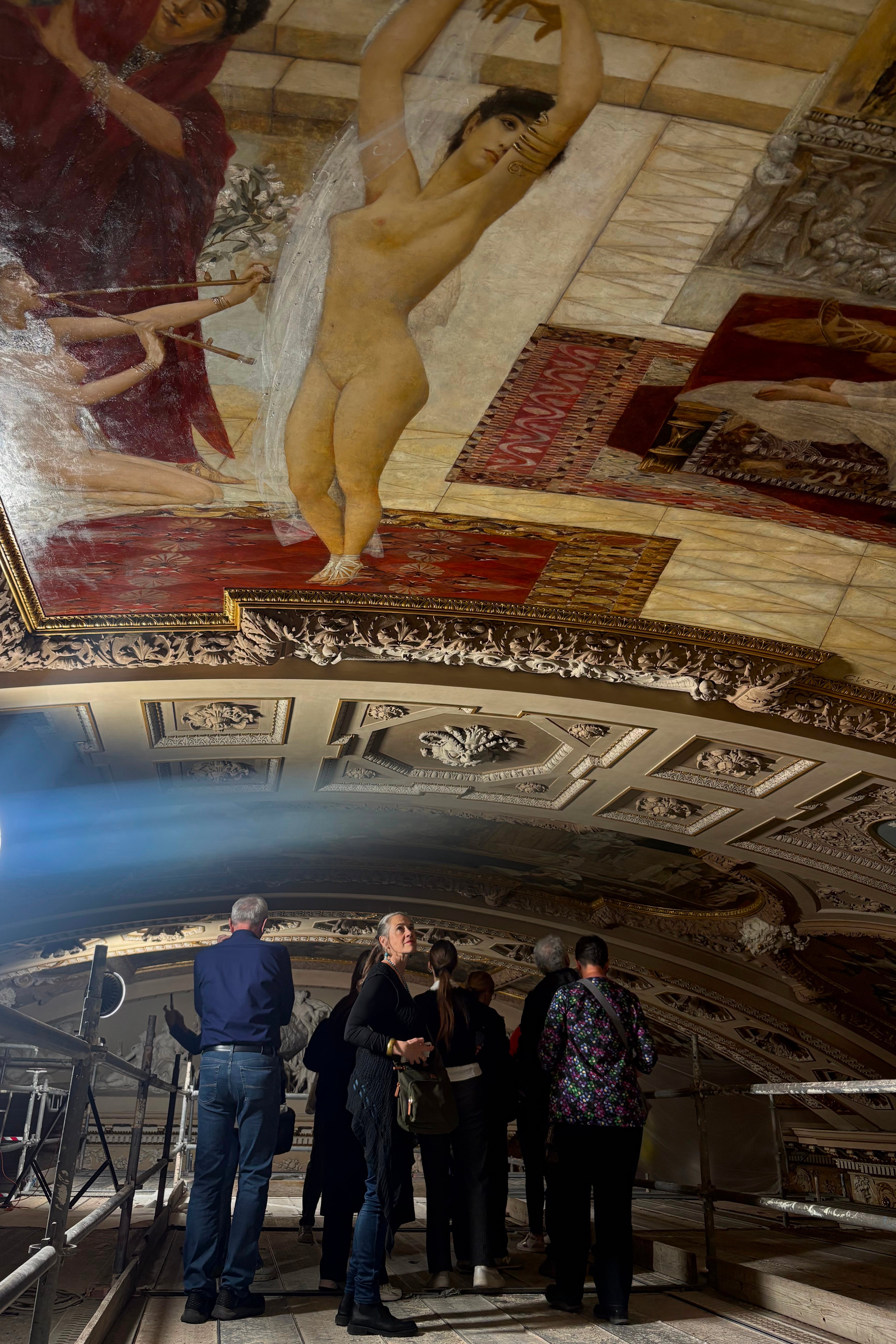 People attend a guided tour of the restoration of Gustav Klimt's ceiling paintings at the Burgtheater in Vienna, Austria