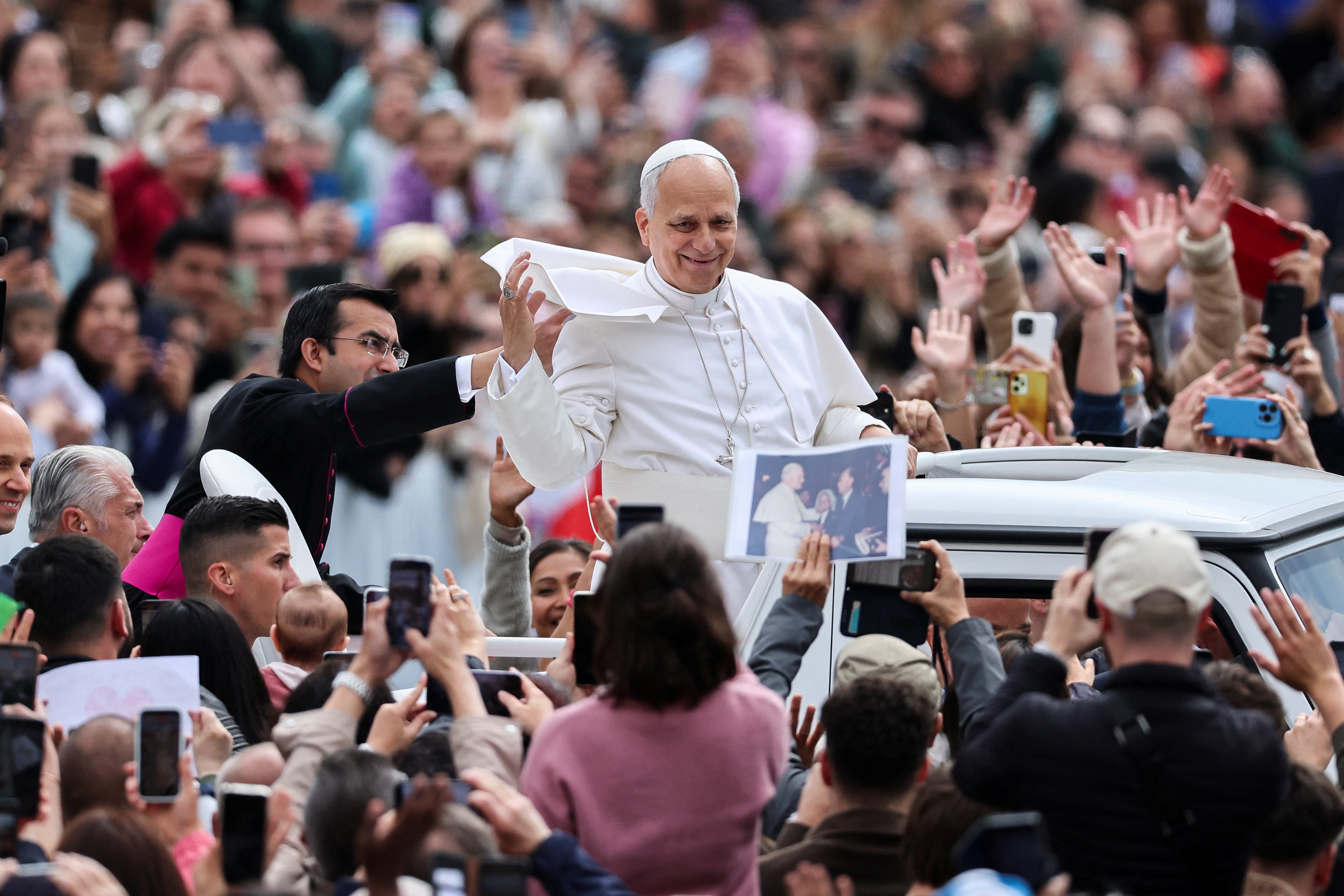 Pope Leo XIV arrives for the weekly general audience in St. Peter's Square at the Vatican.