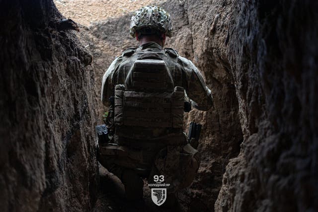 Ukrainian troop in a trench as Russia’s invasion rages