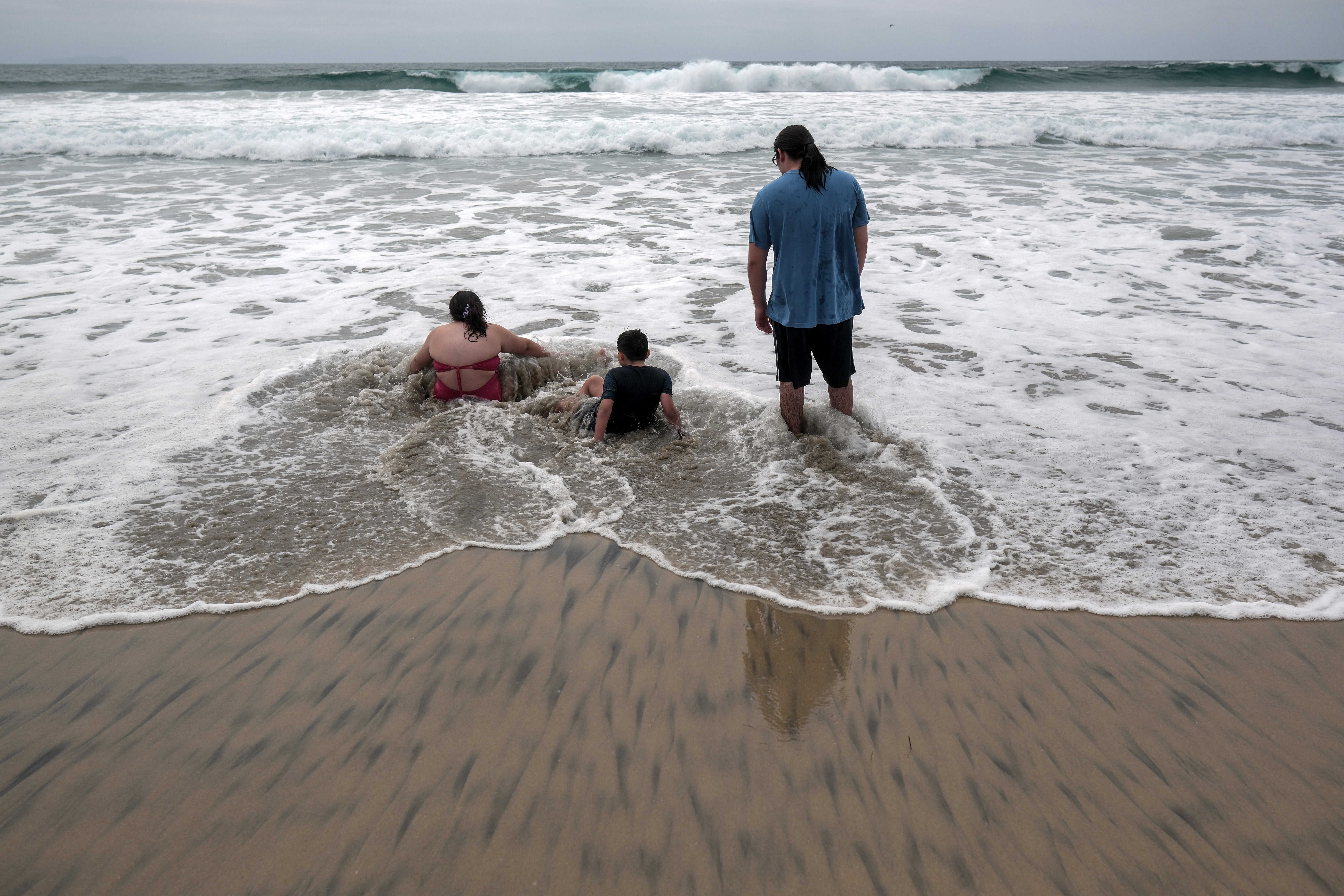 Coronado residents blame both Mexico (where this photo was taken) for the sewage overflows and the U.S. for not acting quickly enough to address the underlying infrastructure problems driving the crisis