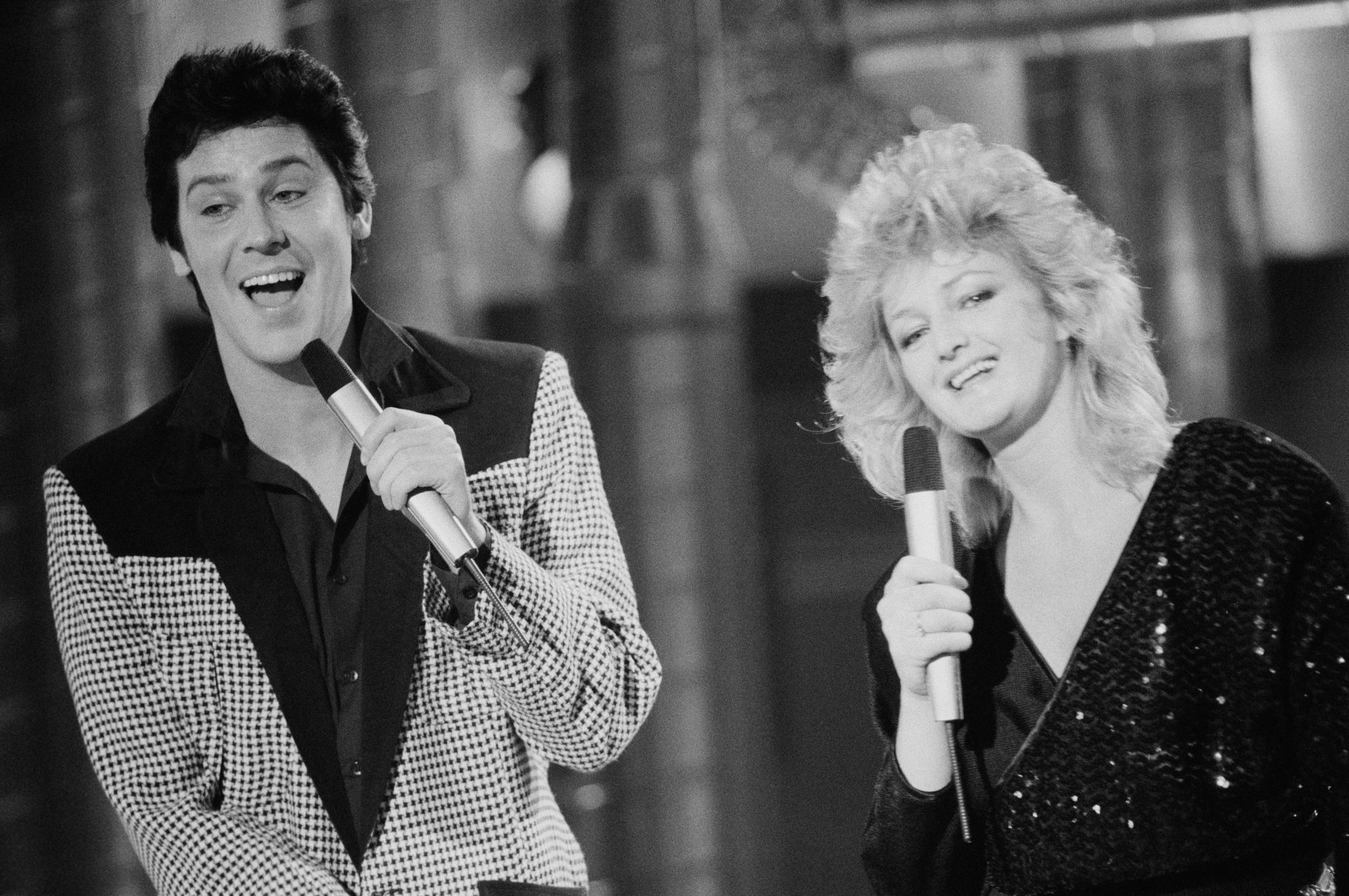 Shakin' Stevens and Bonnie Tyler performing together on the ‘Channel 4 Christmas Show’ in December 1983 (Rogers/Daily Express/Hulton Archive/Getty Images)