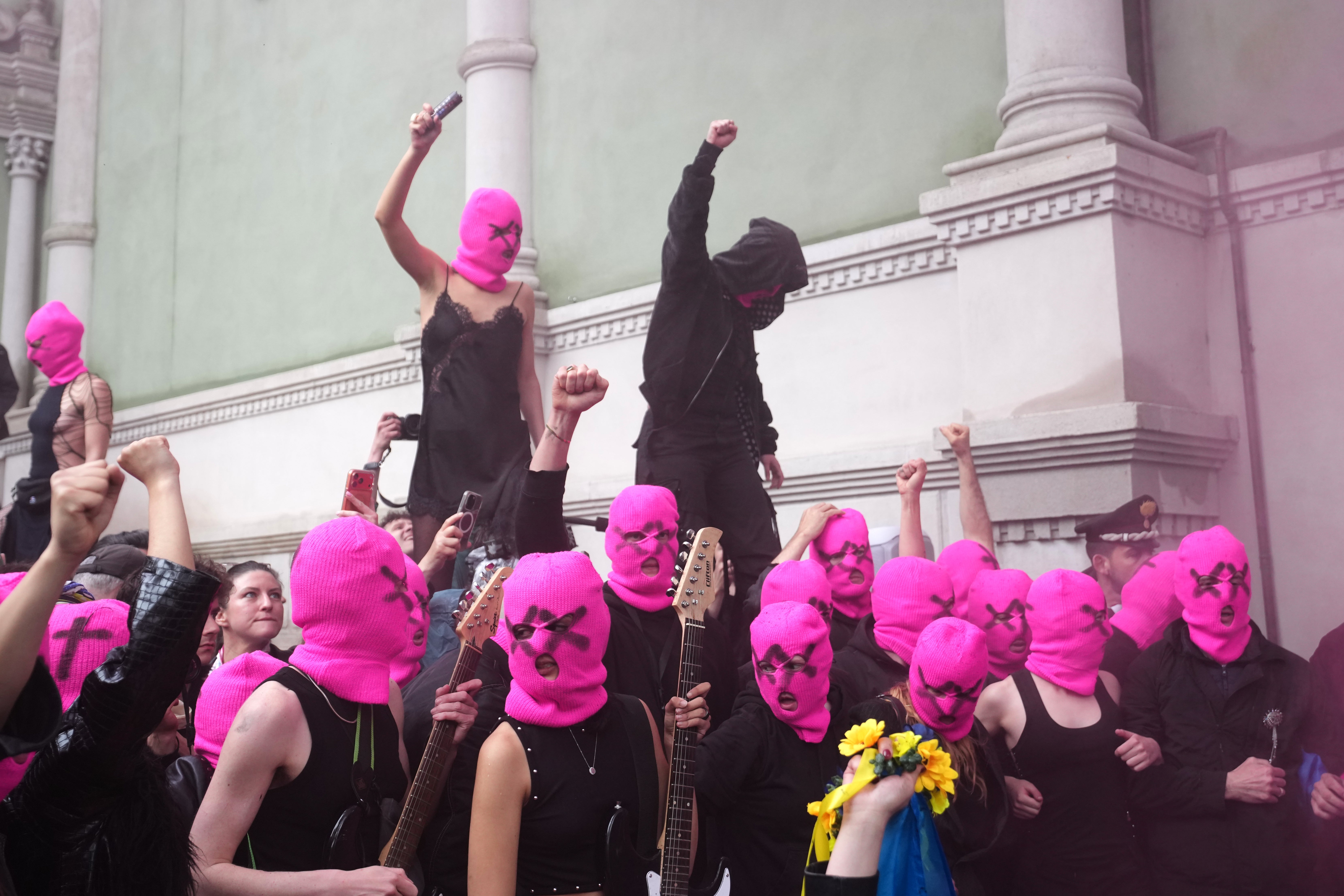 Pussy Riot stage protest blocking access to Russian pavilion at Venice Biennale