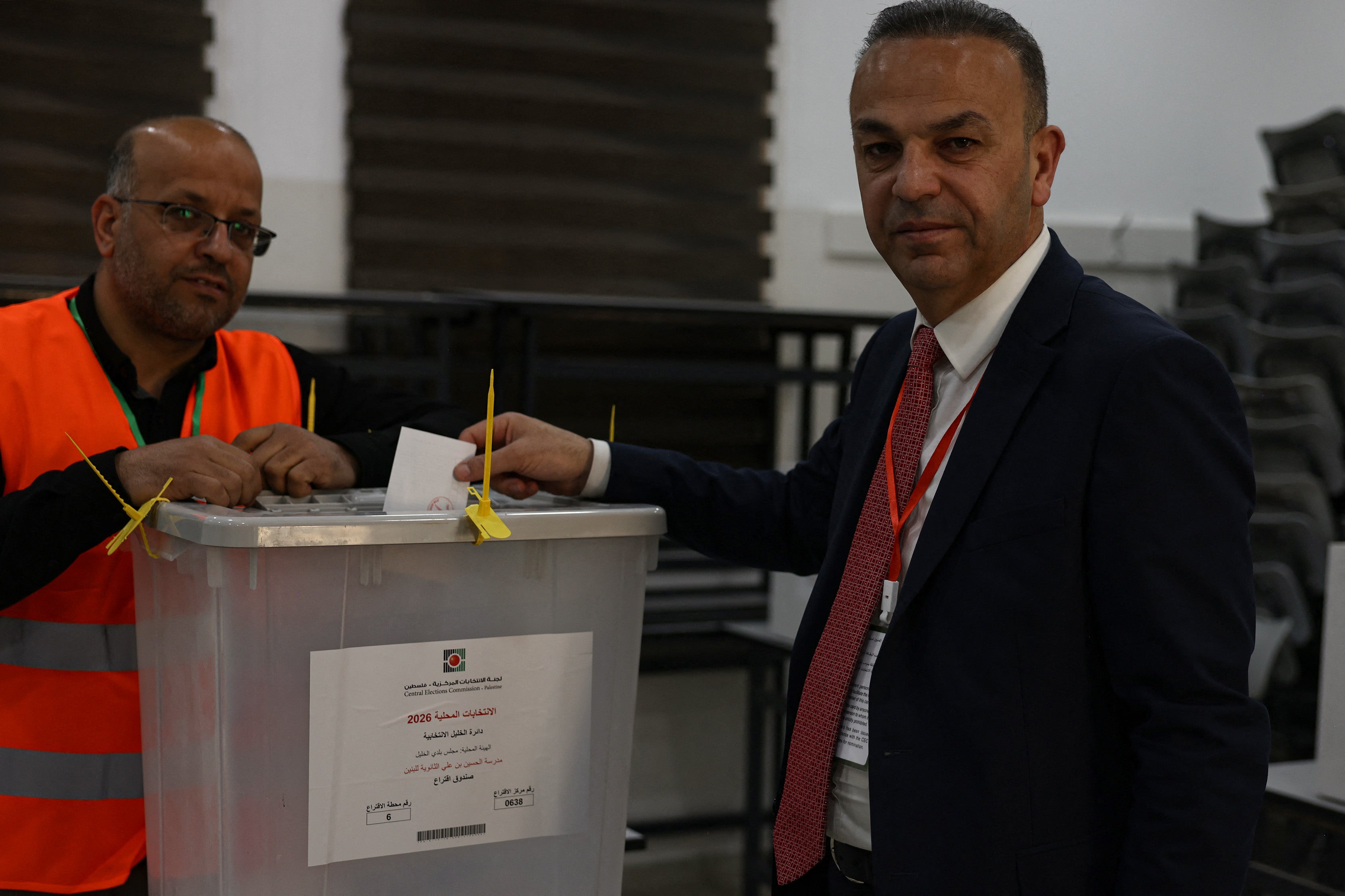 Yousef al-Jaabari, candidate of the Palestinian Fatah movement, casts his ballot at a polling station during municipal elections in the Israeli-occupied West Bank city of Hebron on April 25, 2026