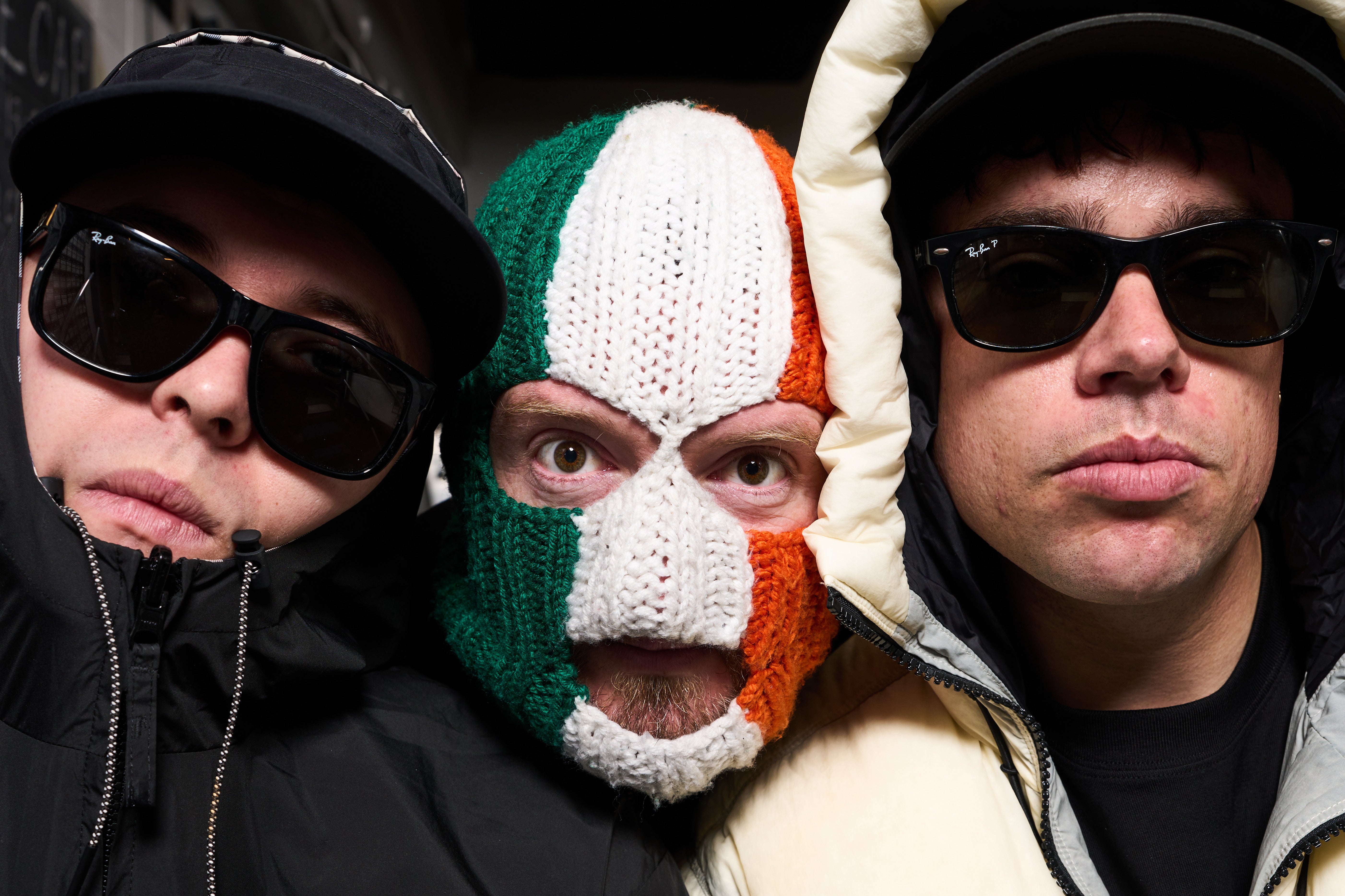 Kneecap, from left: Liam Óg Ó hAnnaidh, aka Mo Chara, J. J. Ó Dochartaigh, aka DJ Próvaí, and Naoise Ó Cairealláin, aka Móglaí Bap