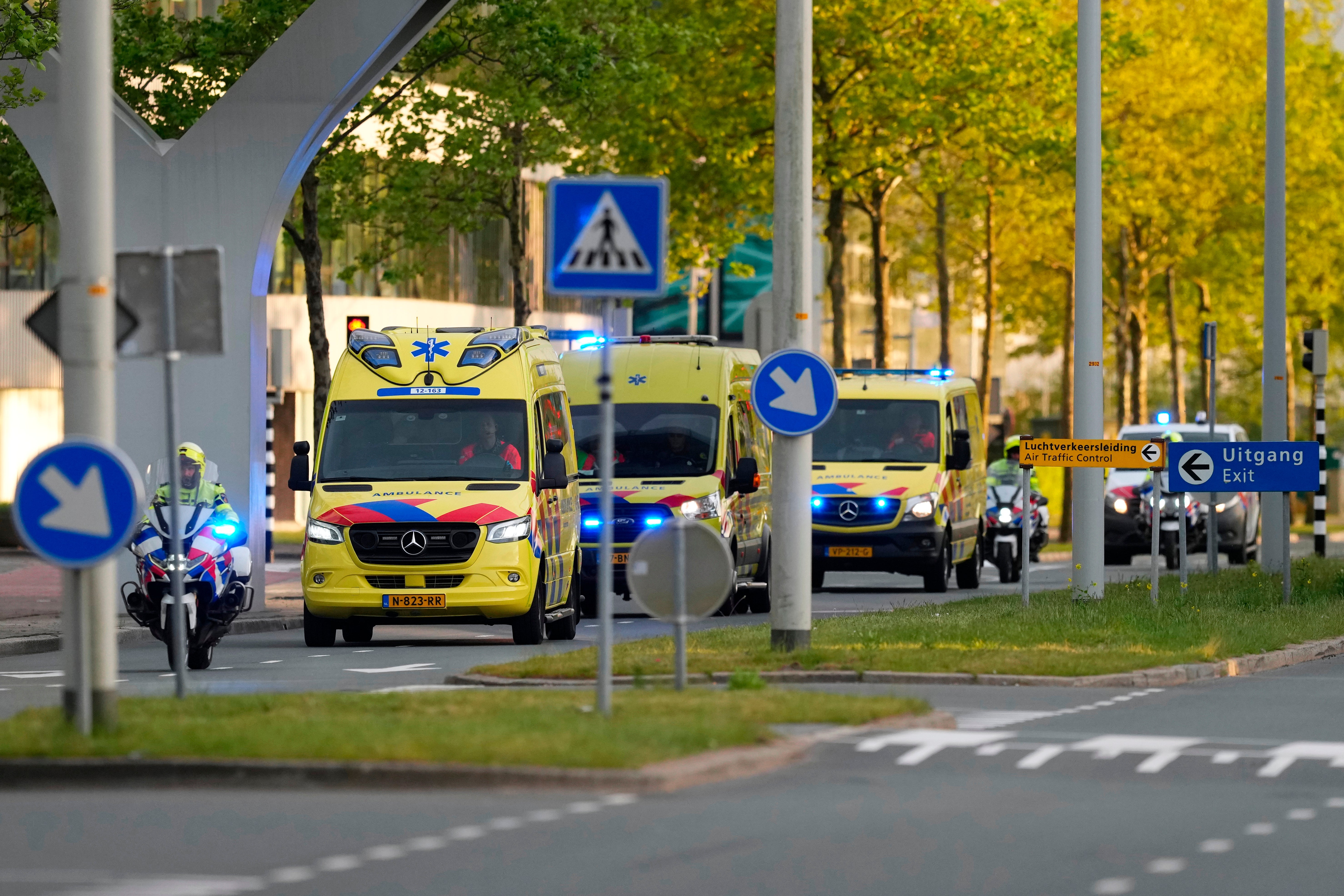 Ambulances in Amsterdam leave with one of three patients evacuated from the MV Hondius on Wednesday