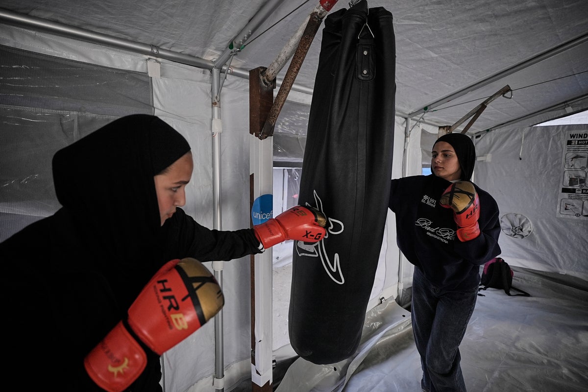 Palestinian girls train at a boxing club in Gaza, in photos