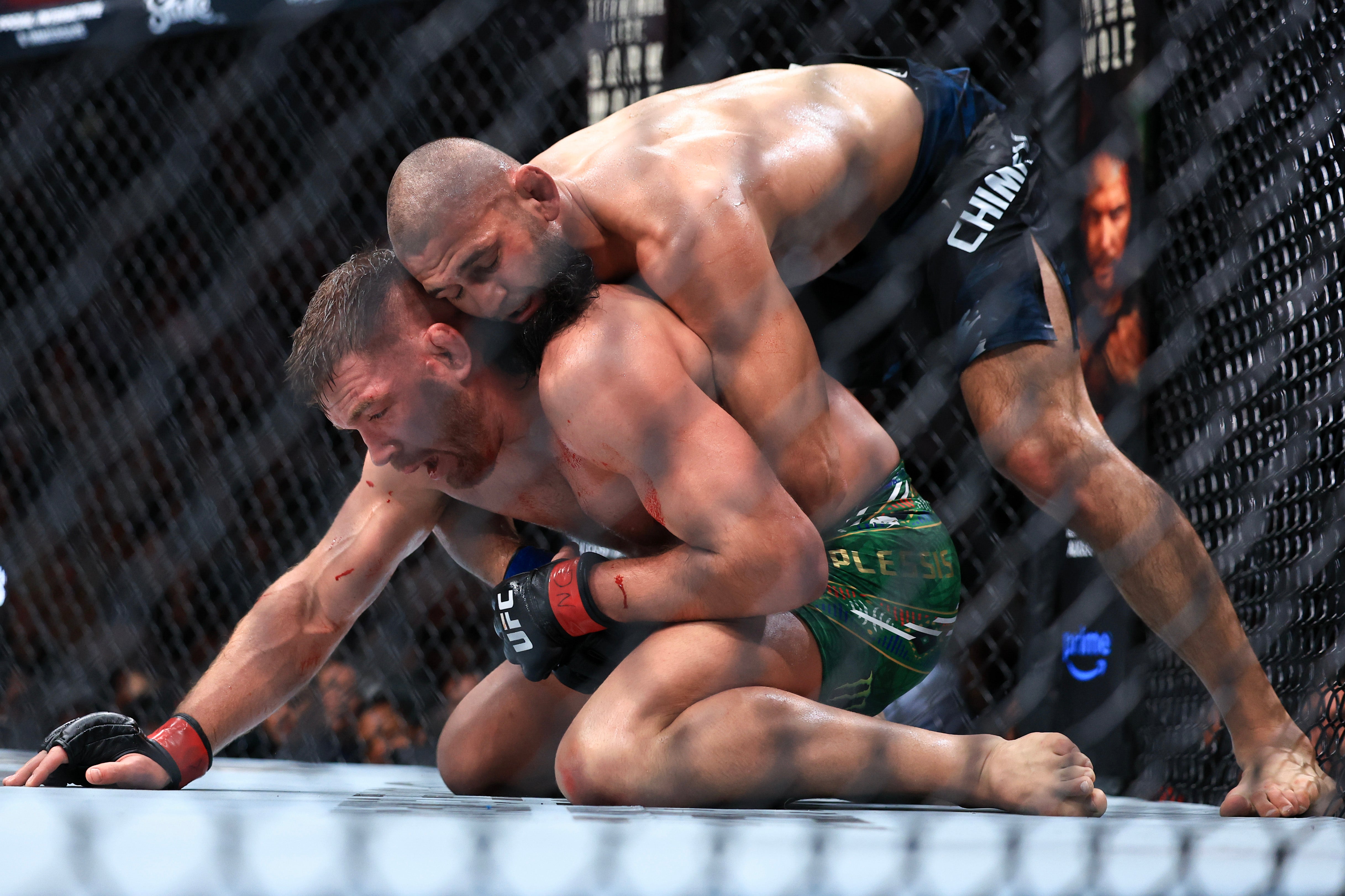 Khamzat Chimaev (right) dominated Dricus Du Plessis to win the UFC middleweight belt