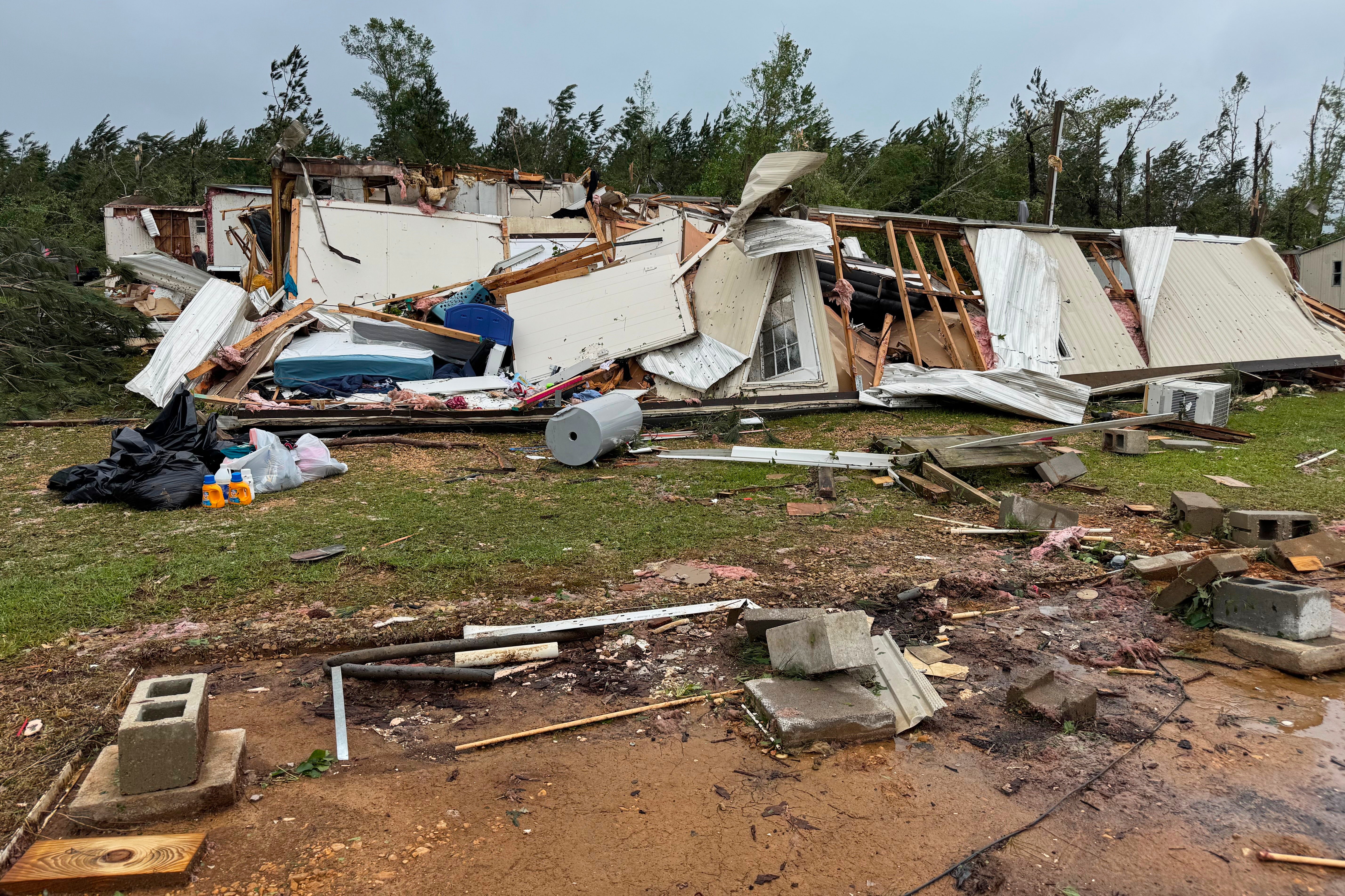 Photos of Mississippi communities reeling after tornadoes | The Independent