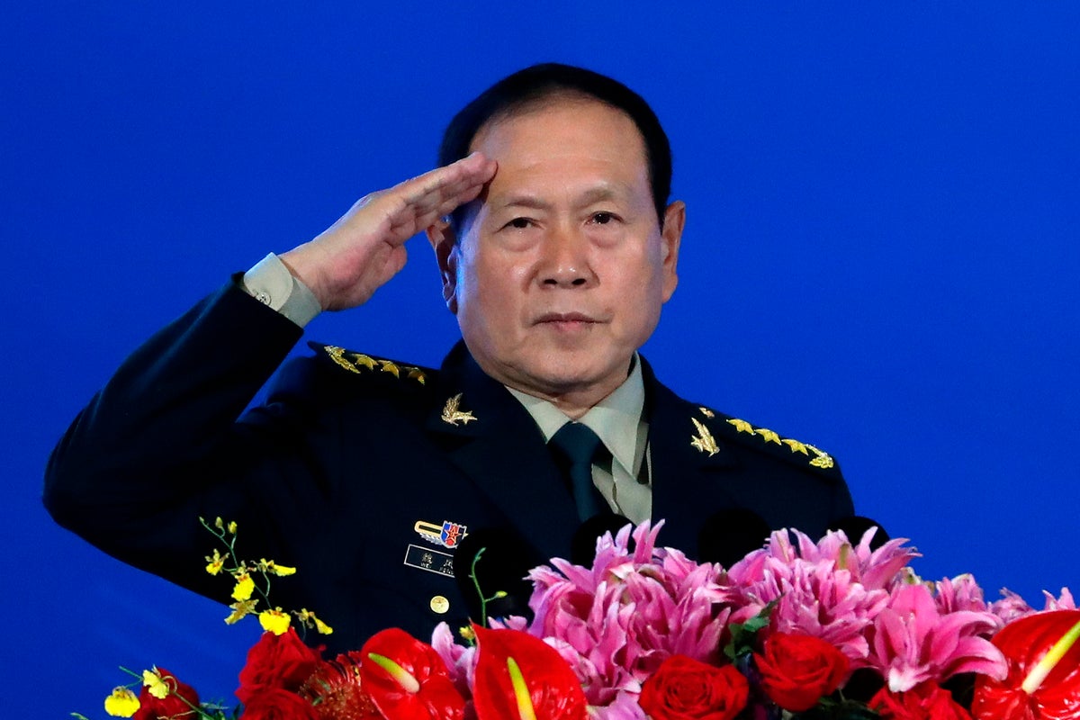 China gives suspended death sentences to 2 former defense ministers accused of bribery