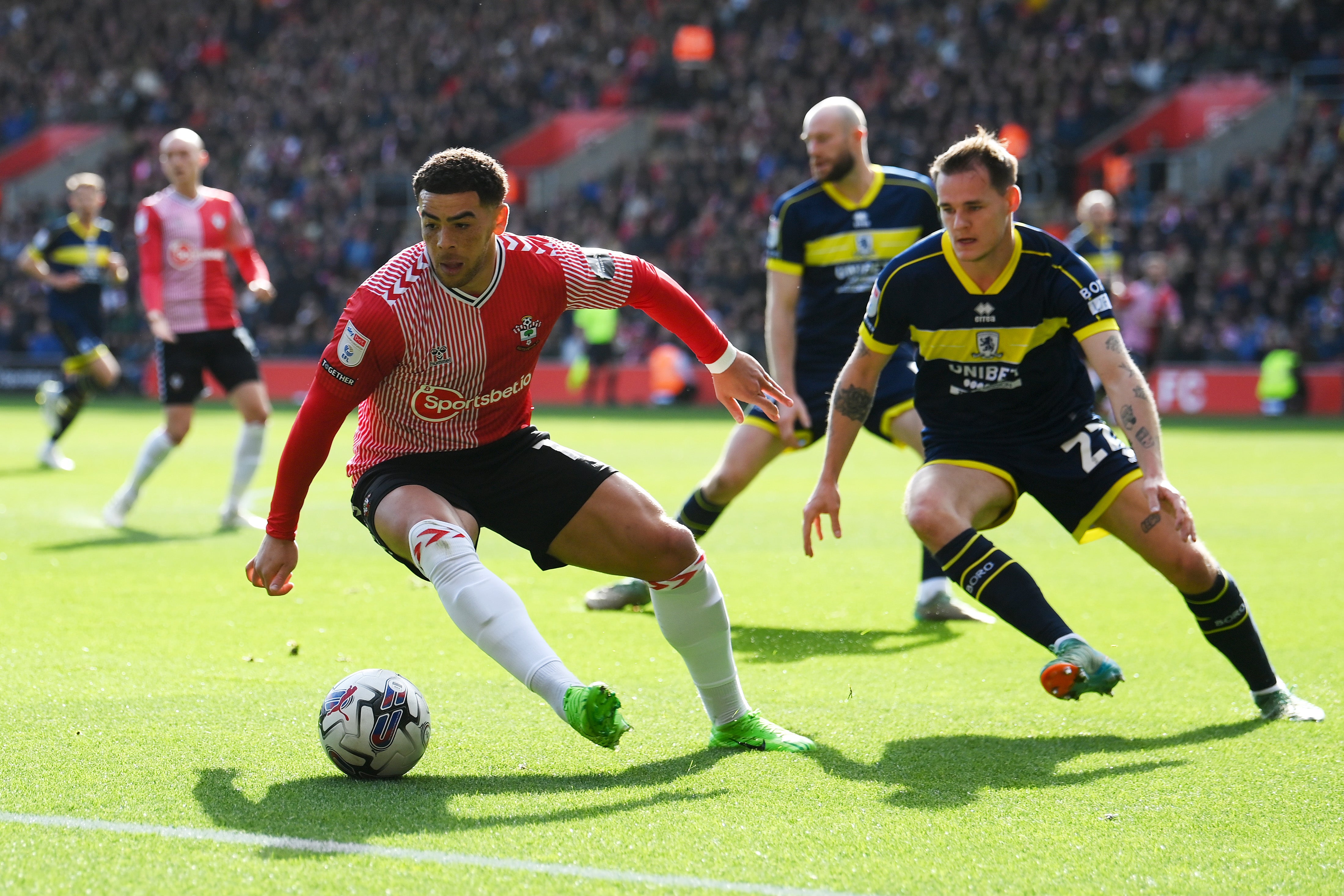 Che Adams of Southampton is challenged by Lukas Engel of Middlesbrough