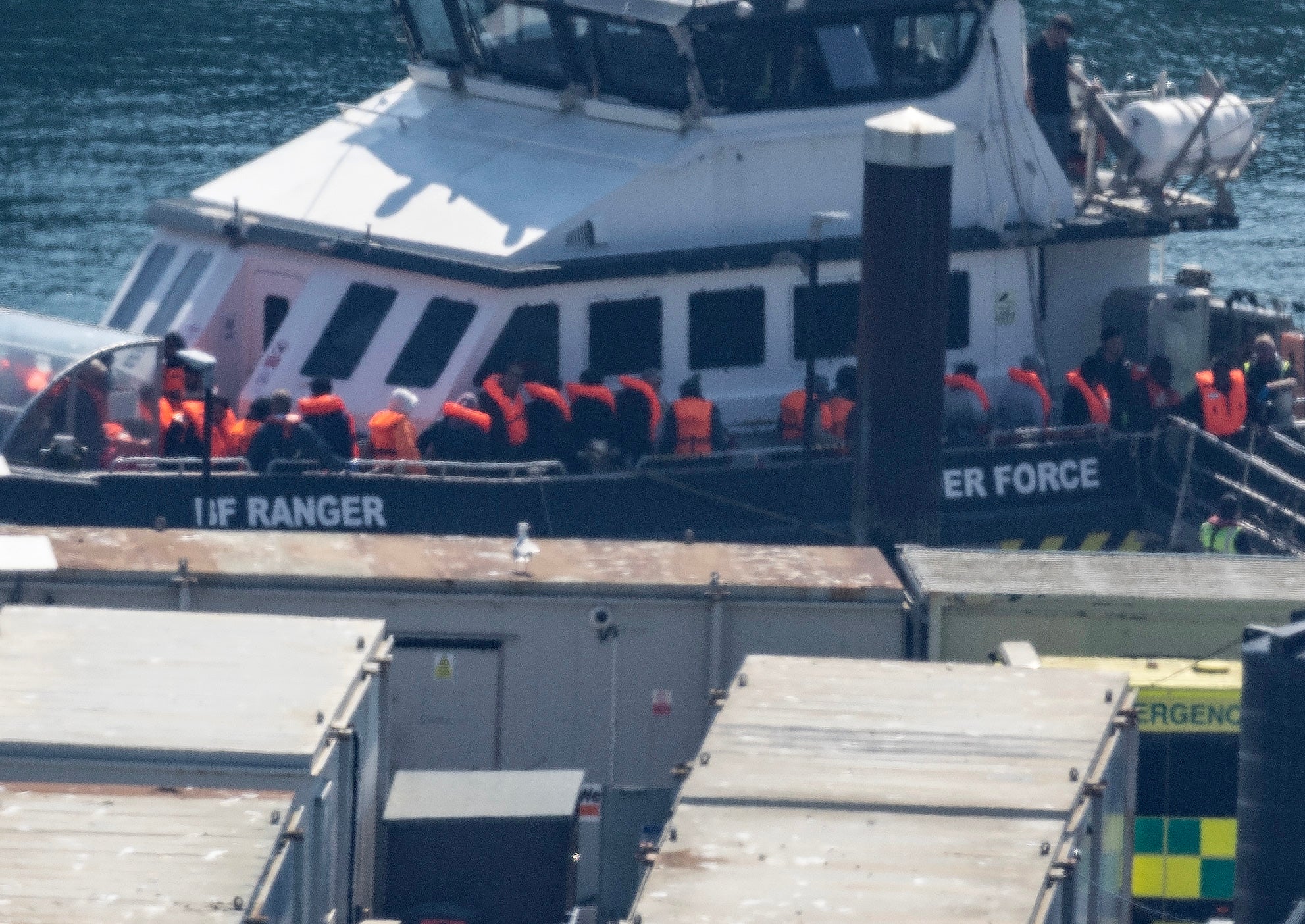 A group of people thought to be migrants are brought in to the Border Security Command compound in Dover, Kent, from a Border Security Command vessel following a small boat incident in the Channel
