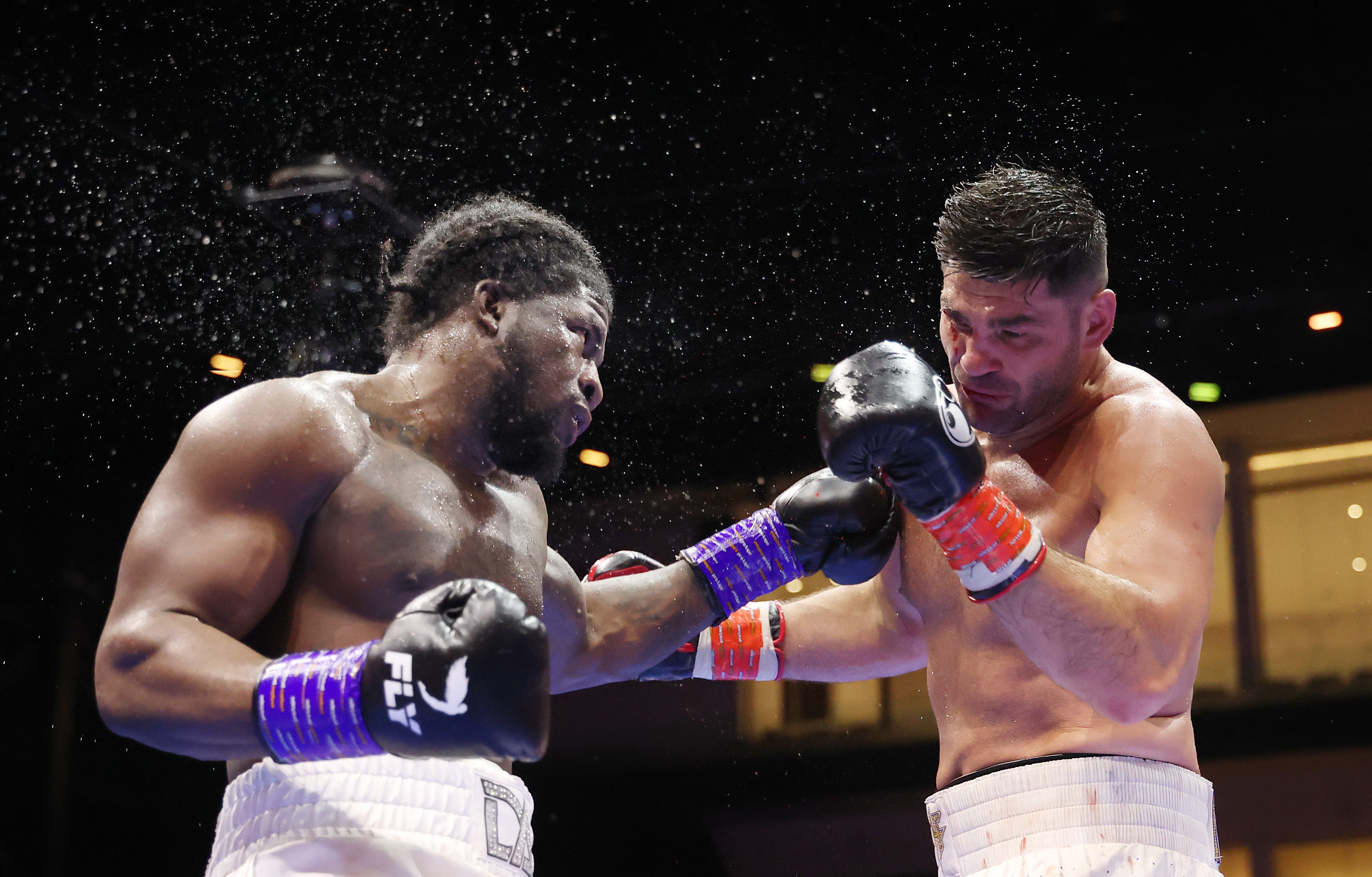 Filip Hrgovic (right) sustained damage against David Adeleye but triumphed on points