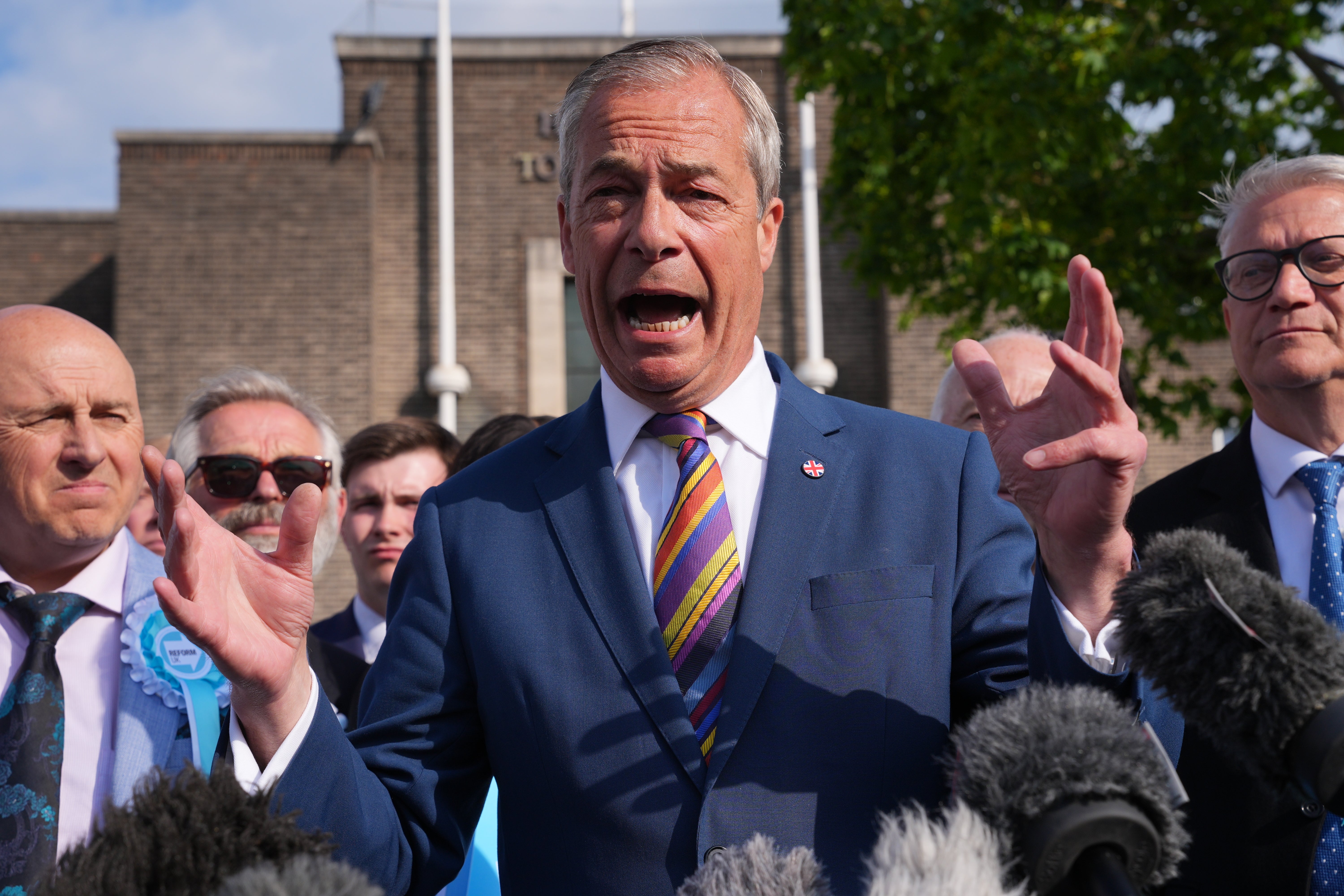 <p>‘Slick hair, healthy complexion, rainbow tie… Reform UK leader Nigel Farage has had a distinctly Blairite rebrand‘ (PA)</p>