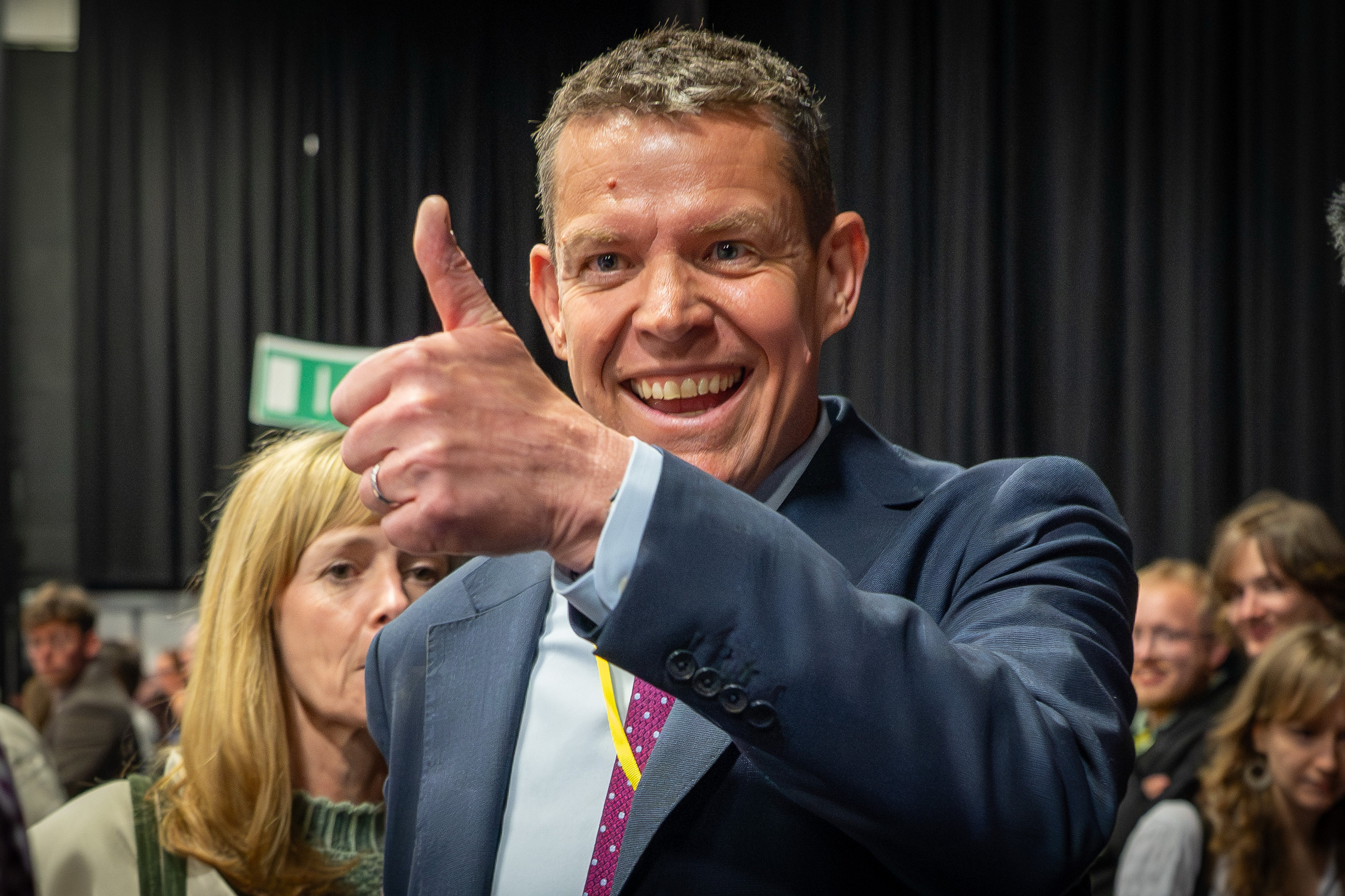 Rhun ap Iorwerth gives a thumbs up sign at a Senedd election count in Llandudno, Wales