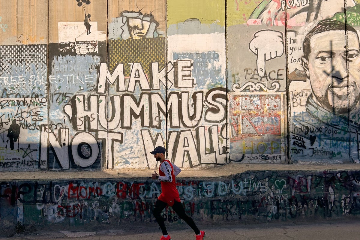 Marathon marks a turning point for a Palestinian runner released from an Israeli prison