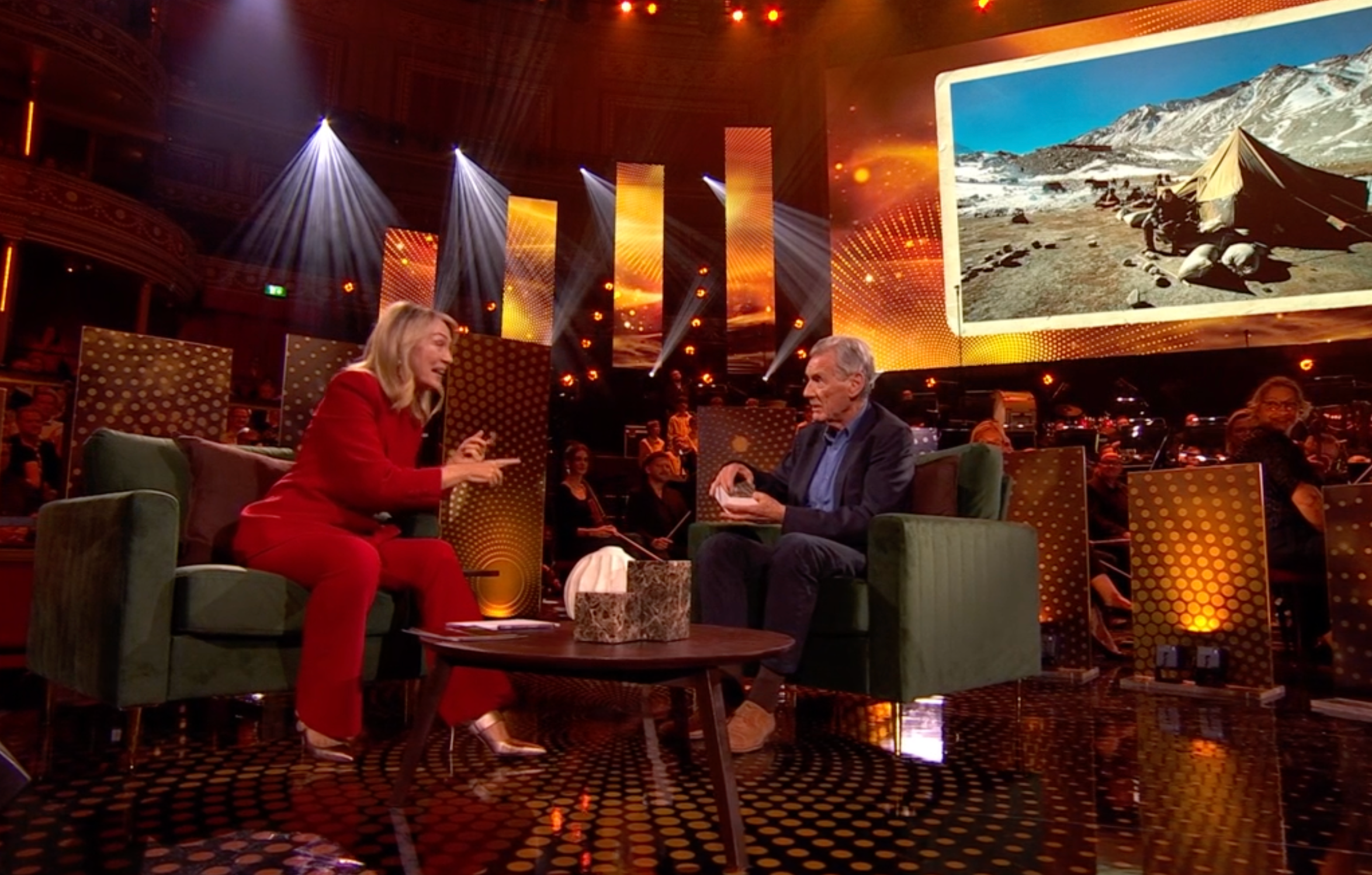 Michael Palin delivers a chunk of Mount Everest to Sir David Attenborough
