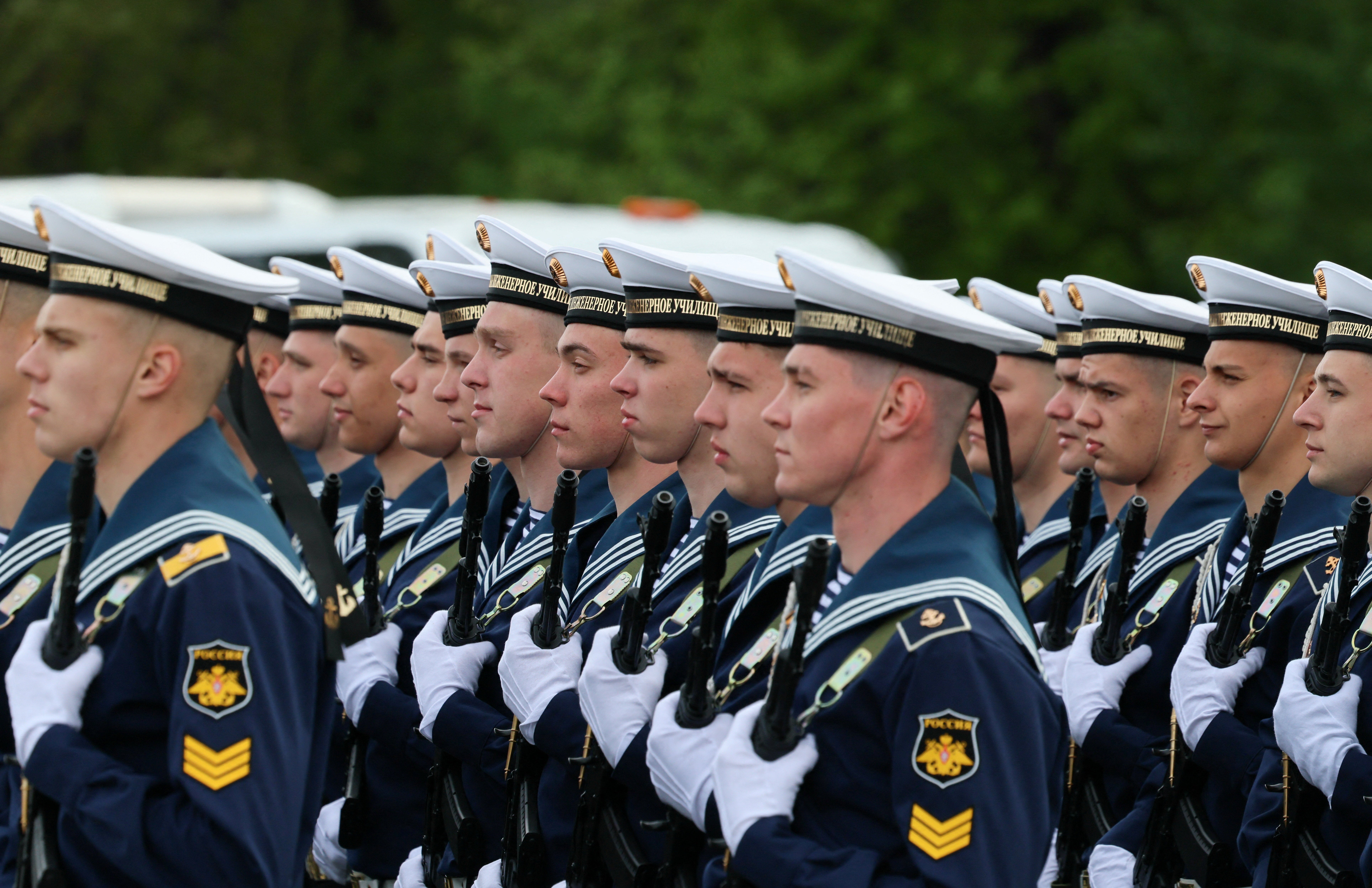 Russian service members line up before a military parade on Victory Day
