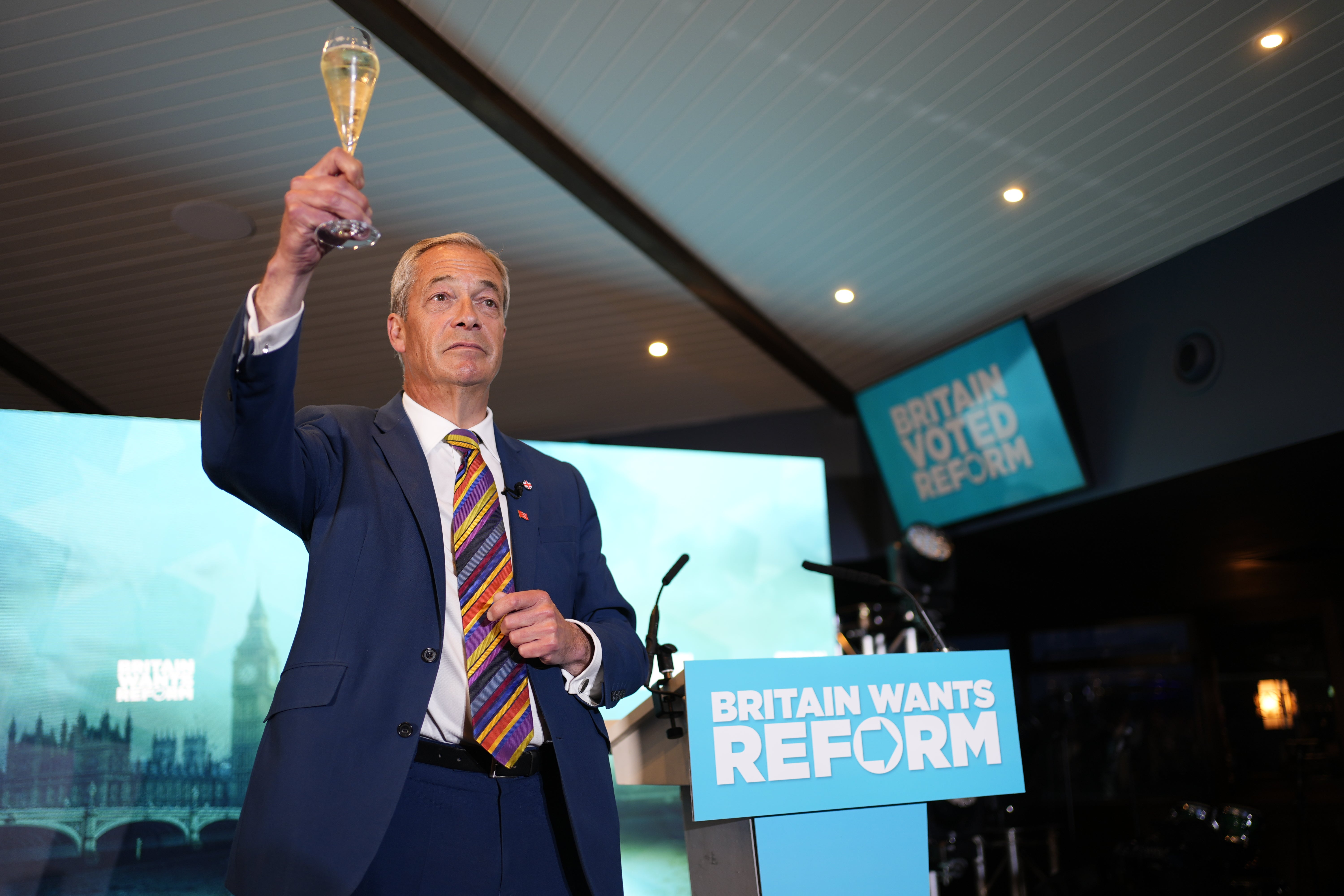 Nigel Farage raises a toast to his supporters