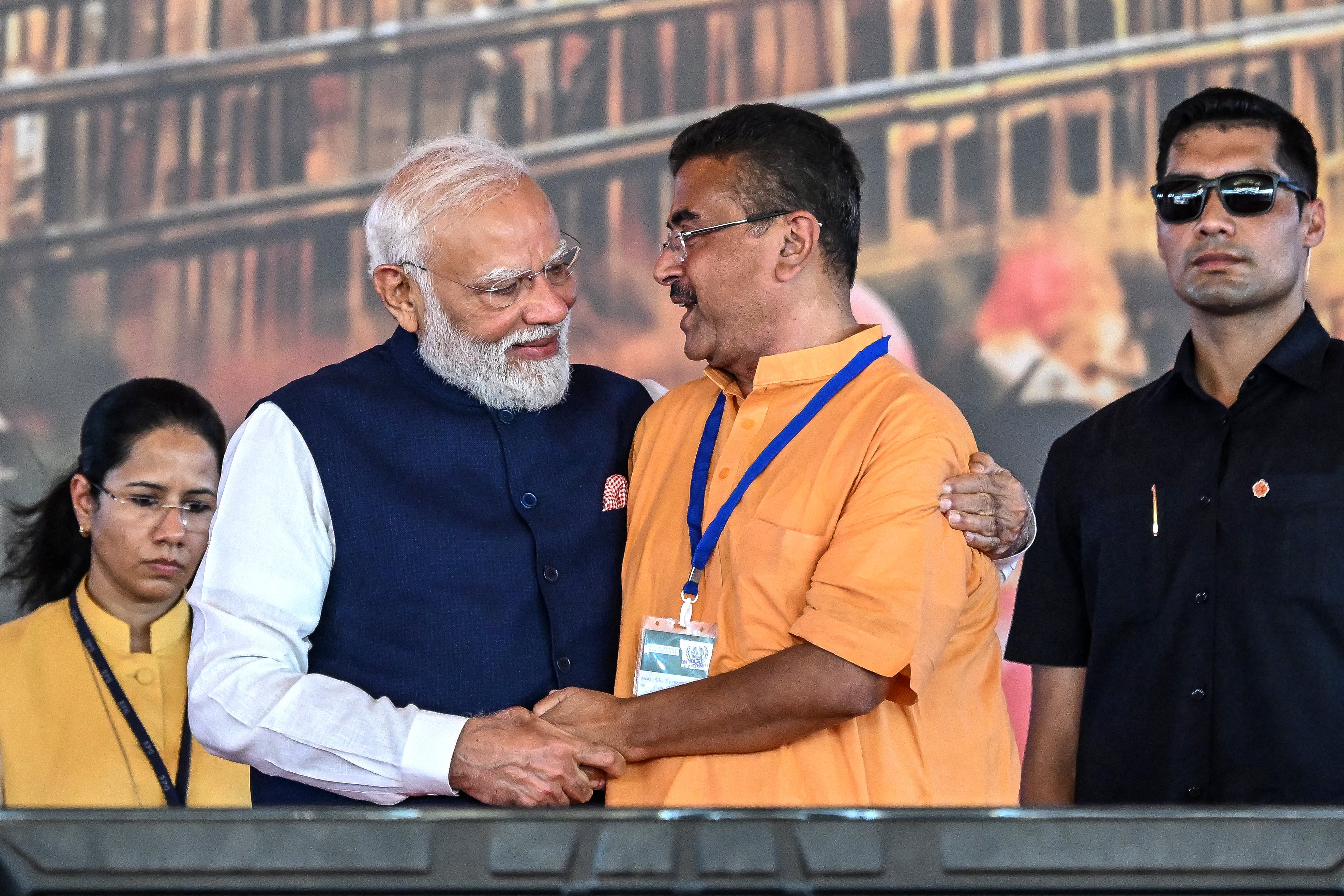 Newly elected Chief Minister of West Bengal state, Suvendu Adhikari greets India's Prime Minister Narendra Modi
