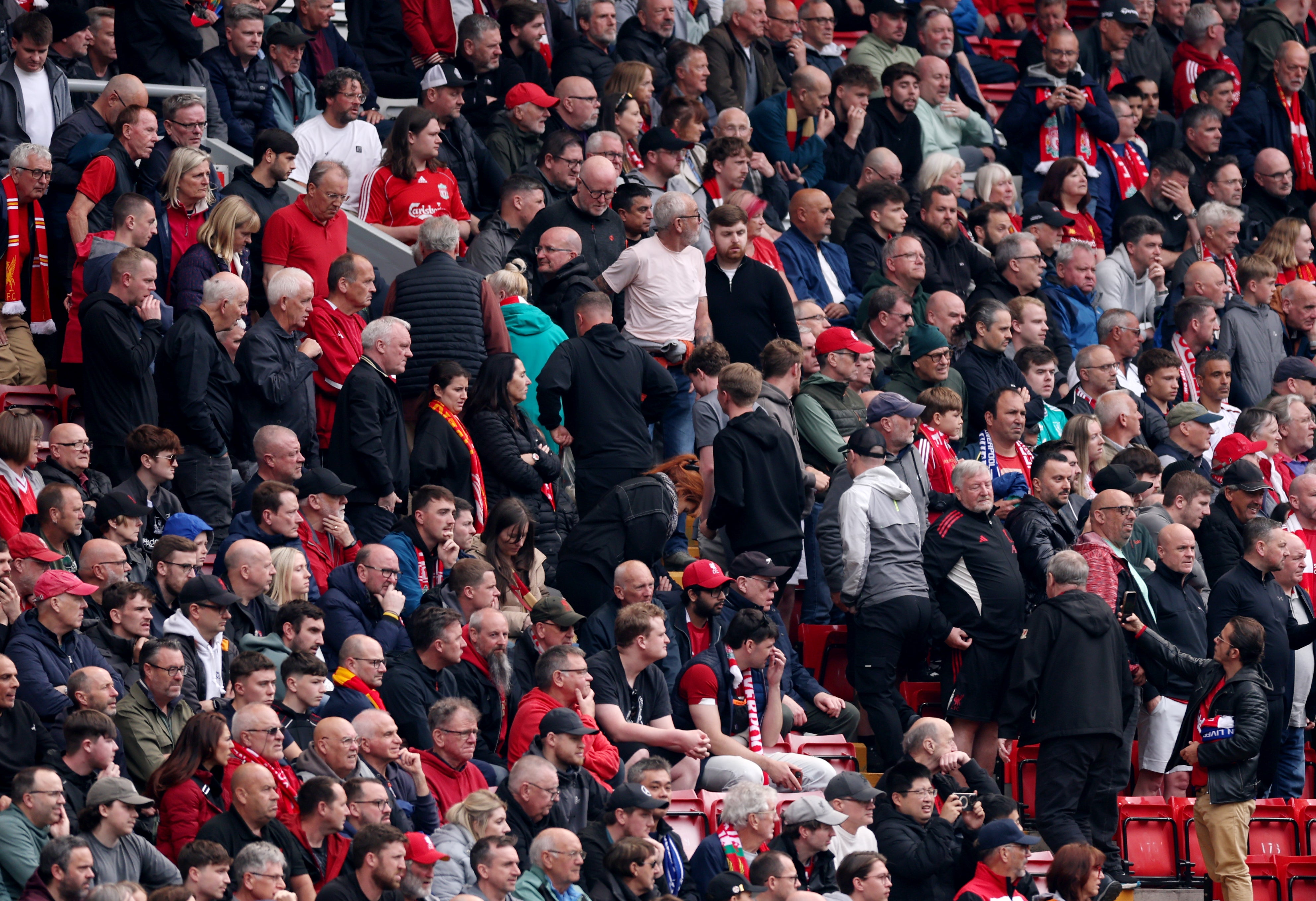 Liverpool fans leave Anfield during the 1-1 draw with Chelsea