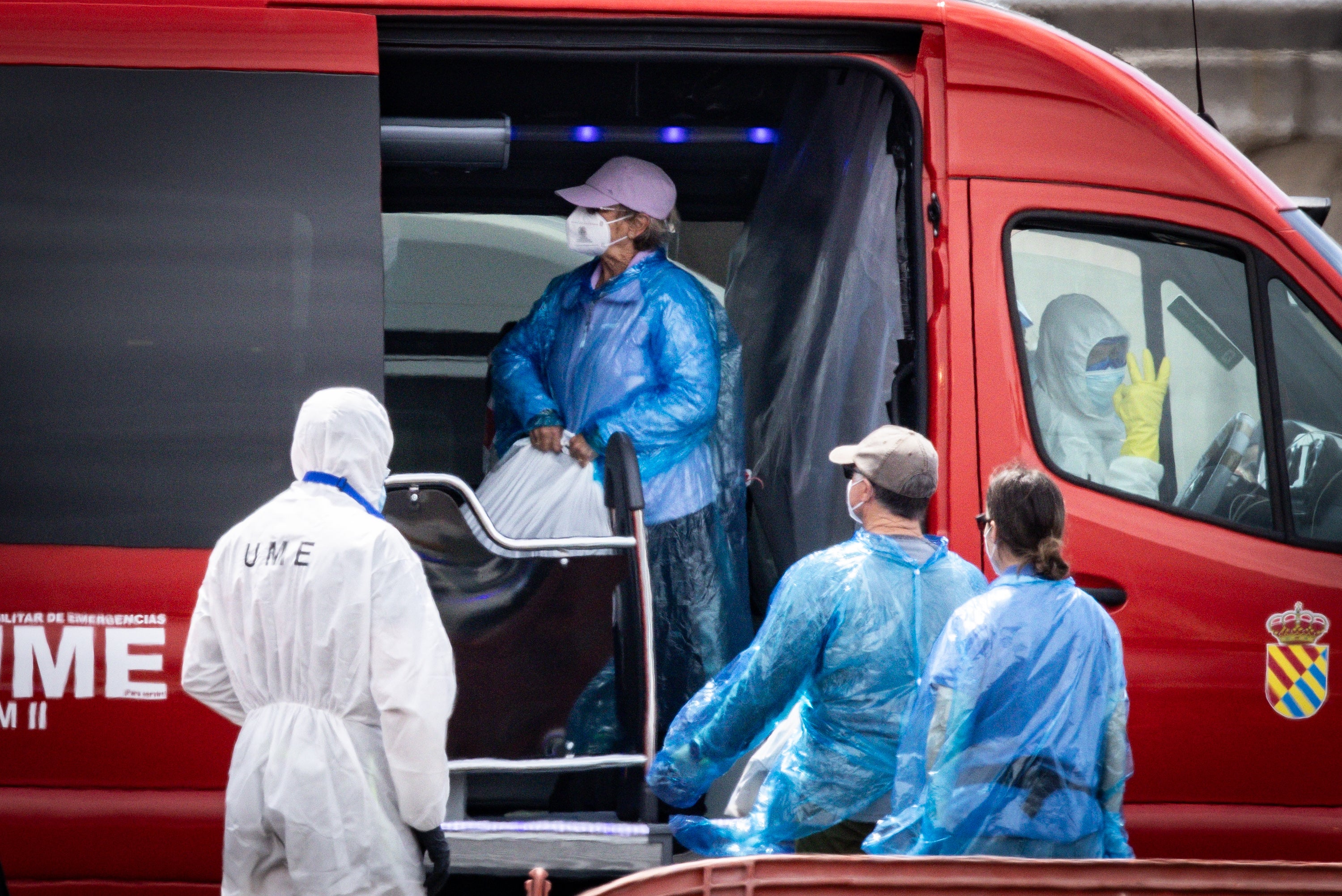 Passengers were evacuated wearing blue PPE