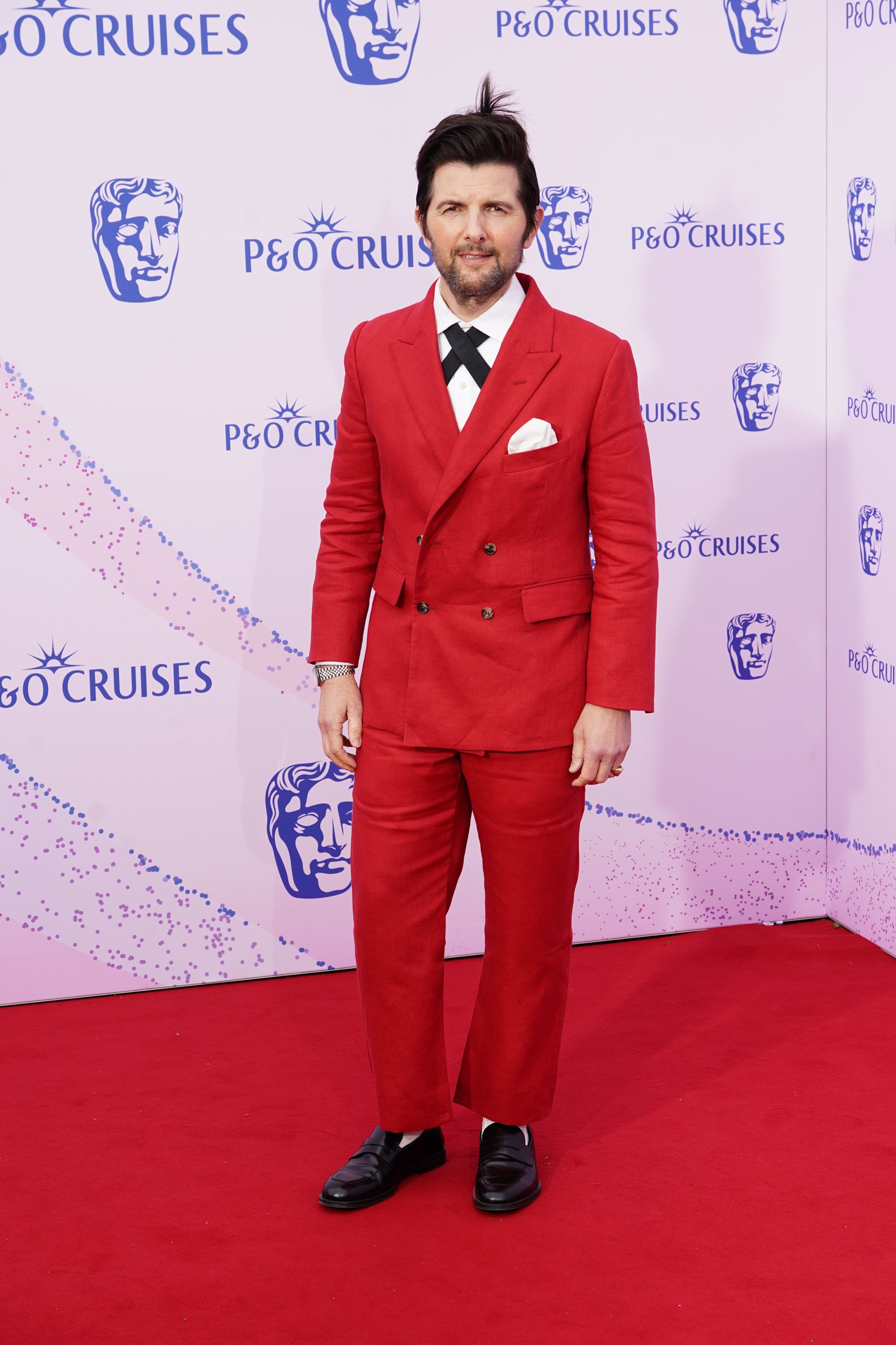 Adam Scott también optó por el rojo