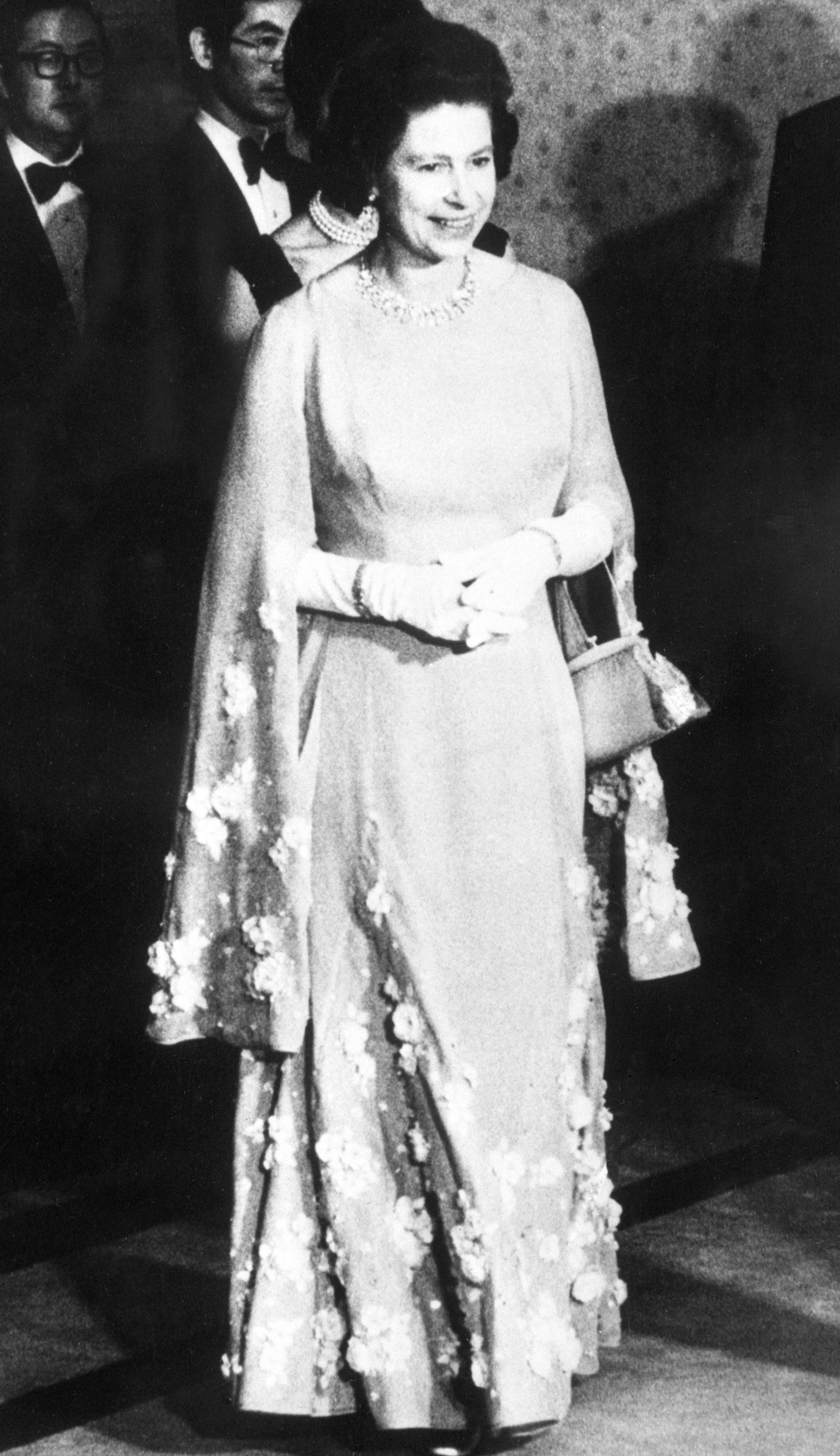 Queen Elizabeth II attending a dinner hosted by then Japanese Prime Minister Takeo Miki