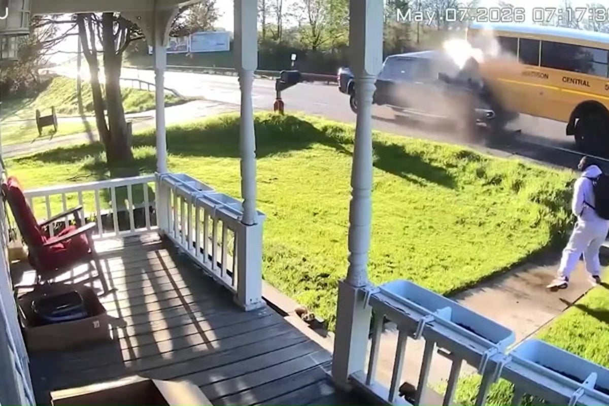 Moment distracted driver rear-ends school bus as teen student is about to board