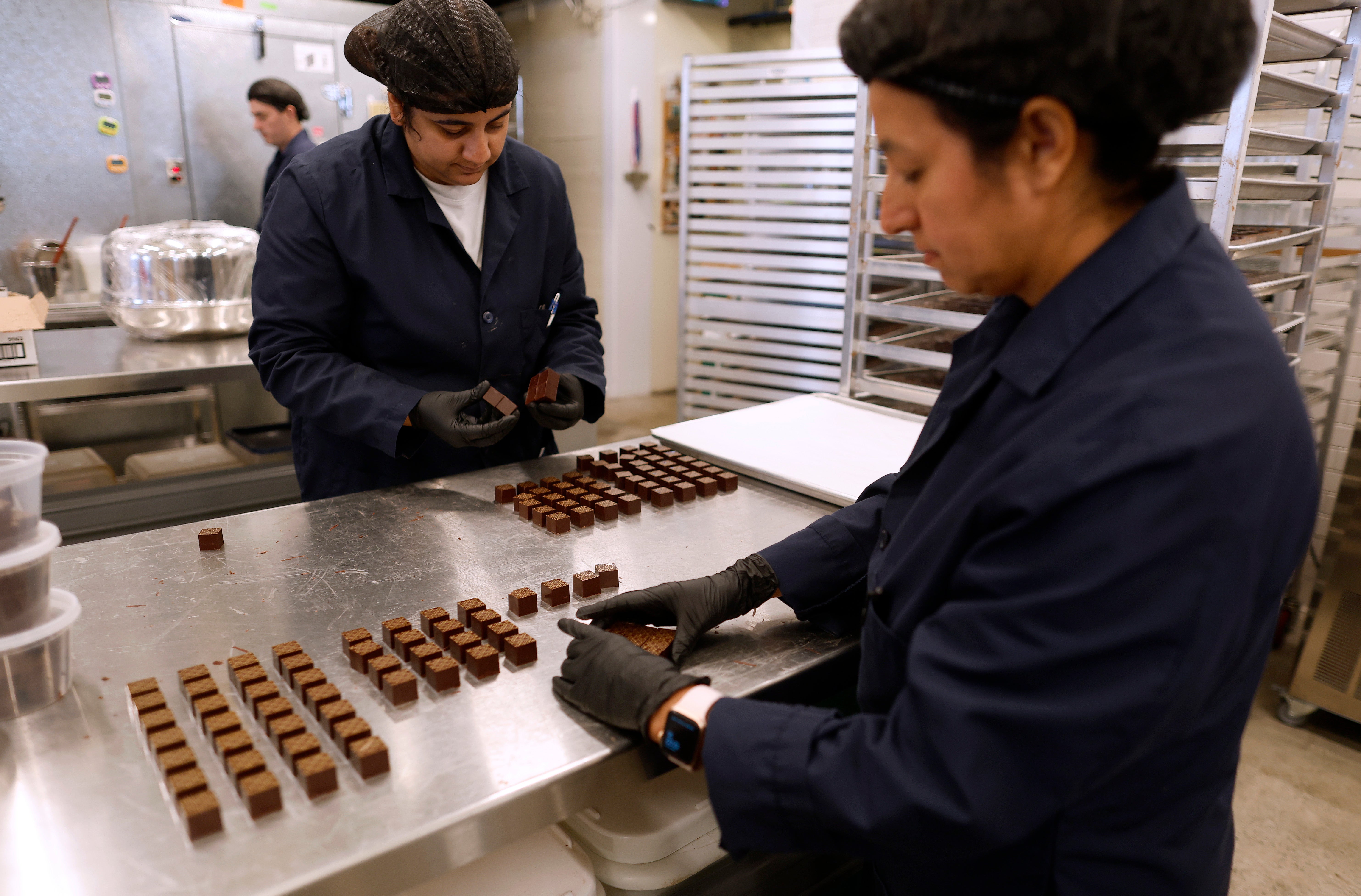 Workers arrange freshly made chocolate truffles at the Dandelion Chocolate 16th Street Factory in San Francisco, California, last May. Dark chocolate is rich in antioxidants that fight harmful inflammation
