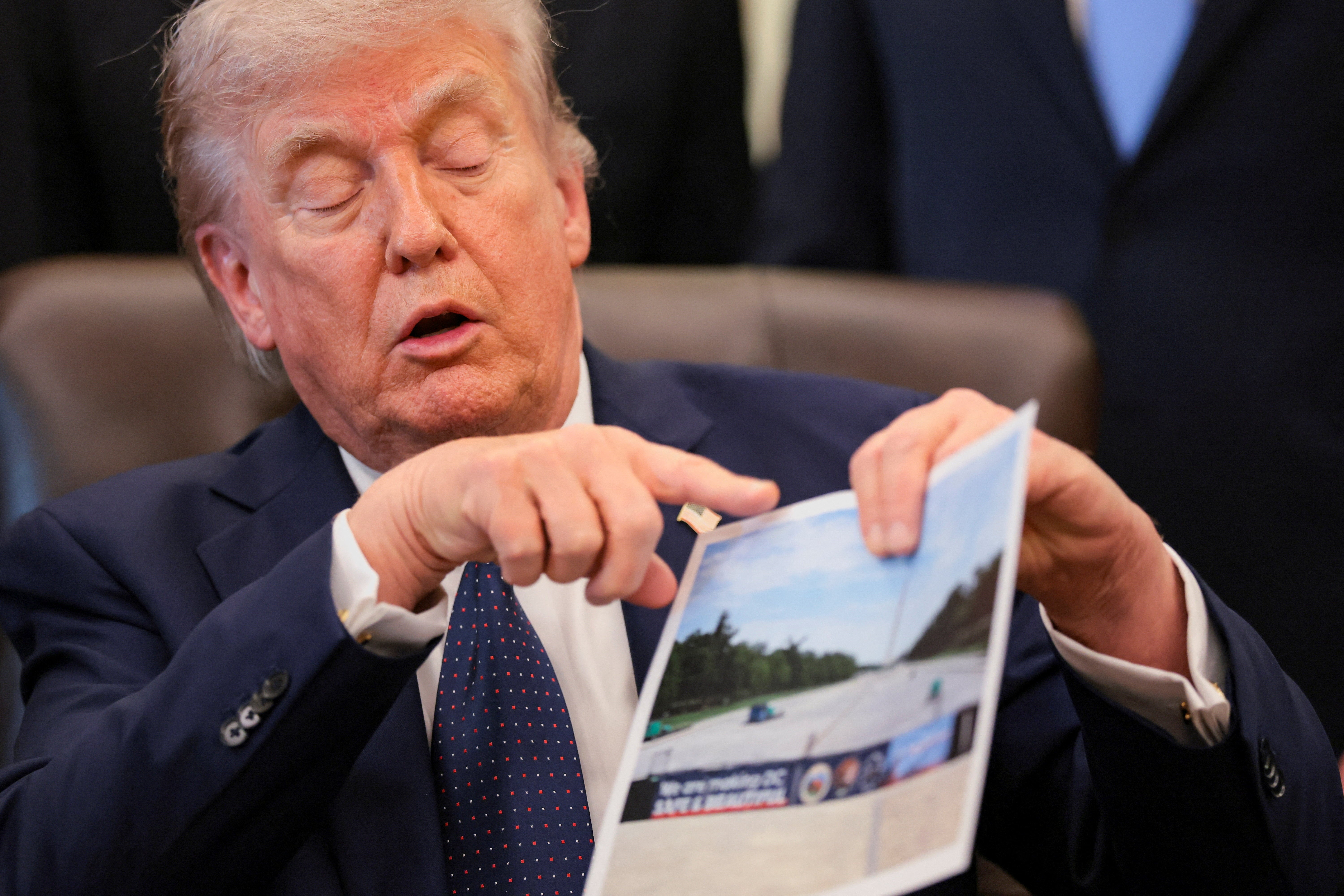 A nonprofit group says the Trump administration is violating federal law with a paint job that is ‘more appropriate to a resort or theme park’