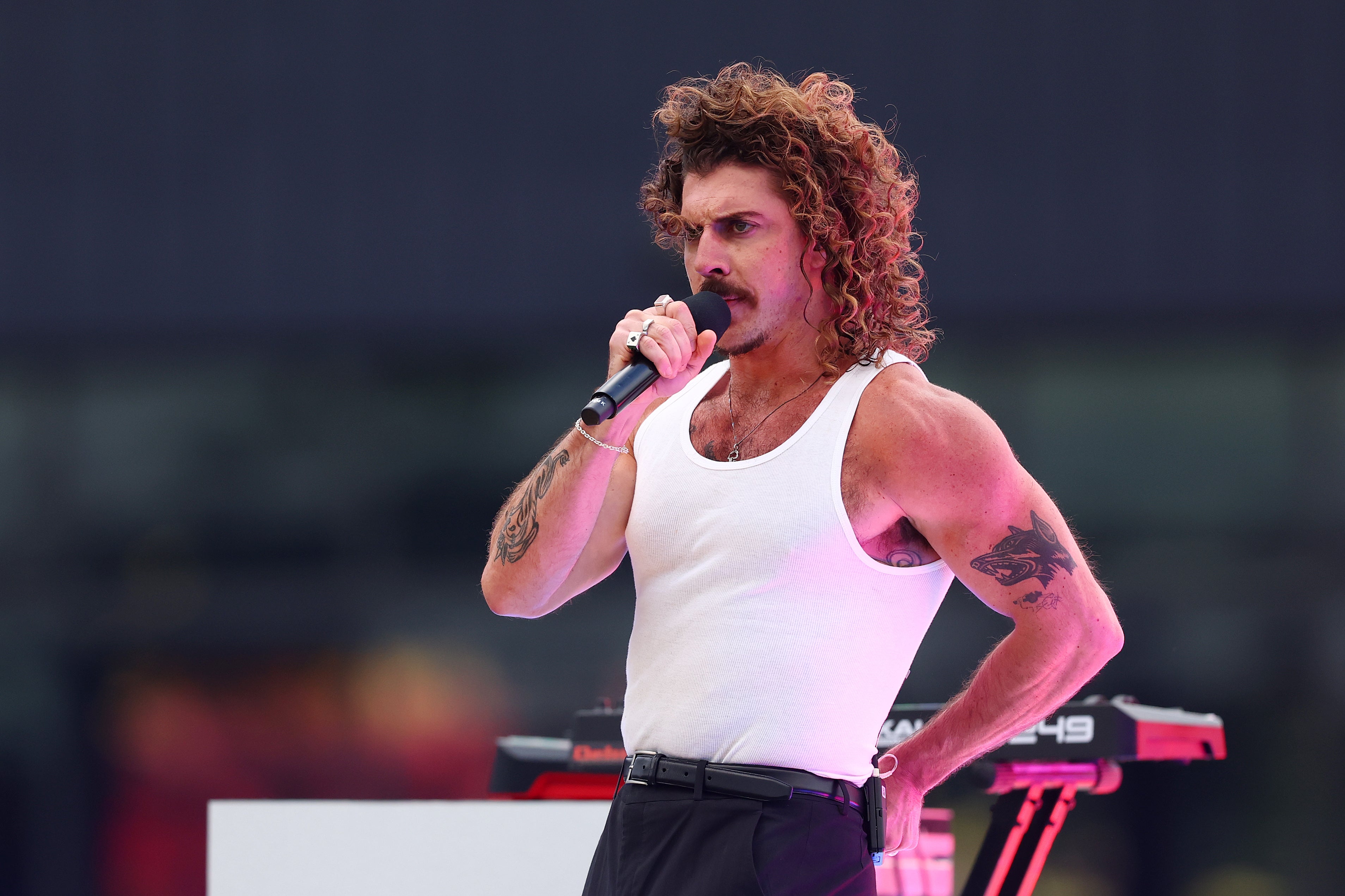 Australian singer Keli Holiday denied entry into US as girlfriend apologises for Trump post