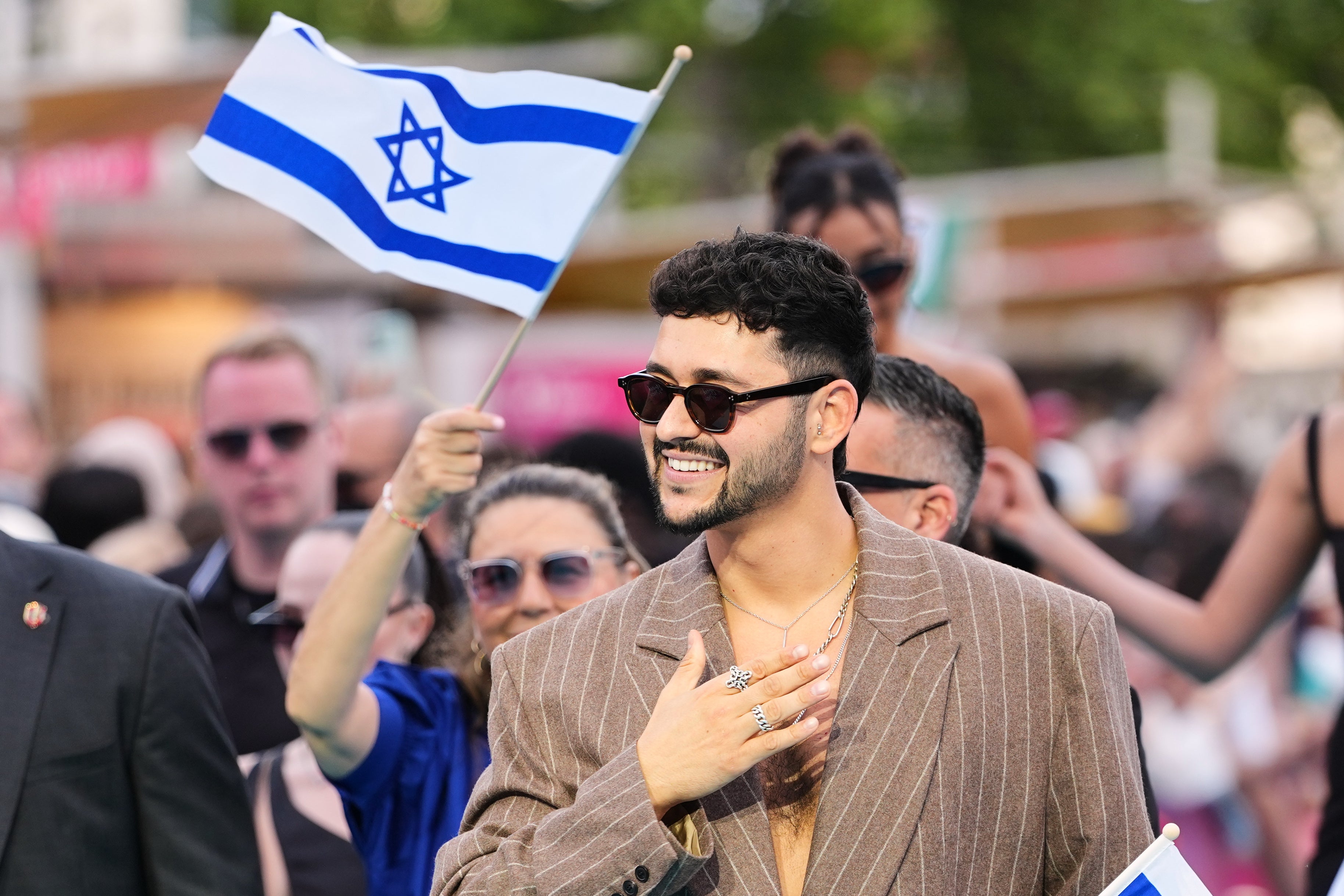 Why is Israel allowed to participate in Eurovision and who has demanded they be banned?