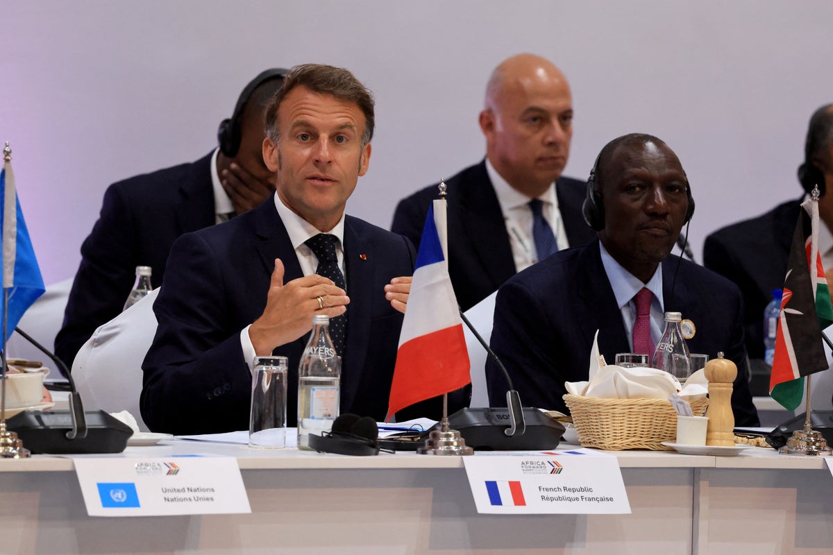 Macron interrupts speaker to ask for silence in awkward moment