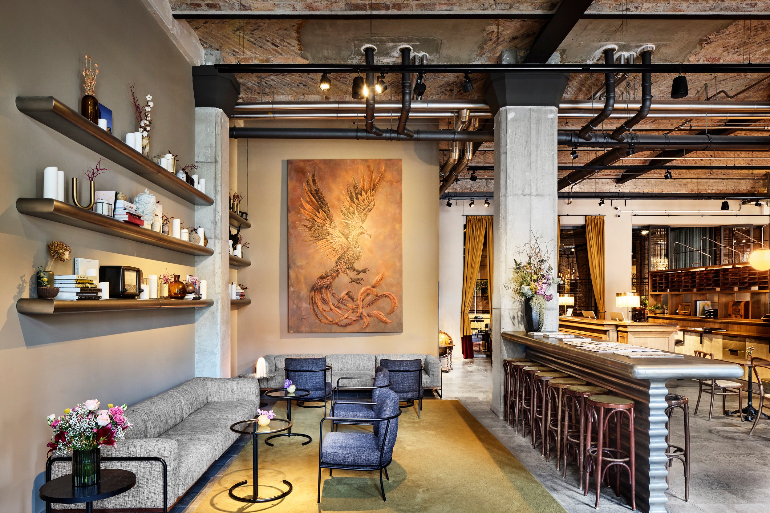 The lobby combines Art Deco and industrial-chic design details