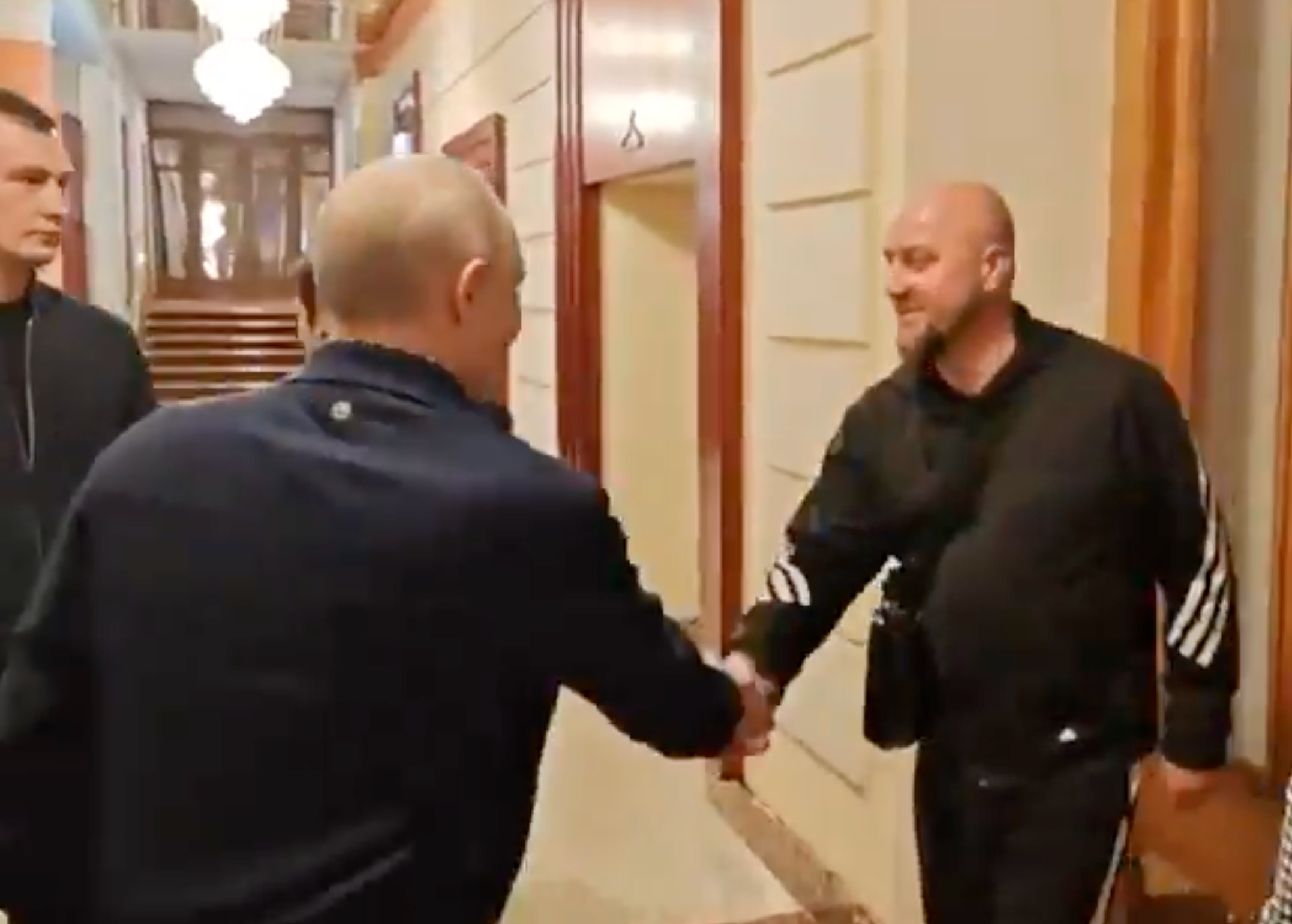 Vladimir Putin shook hands with the man during an apparent chance encounter in a Moscow hotel lobby