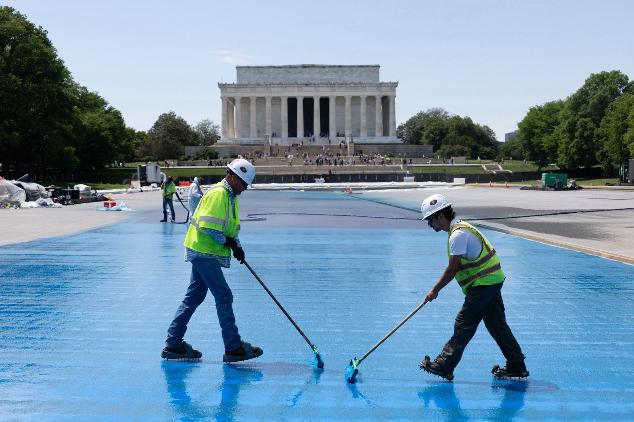 ‘The choice of American Flag Blue will enhance the visitor experience by making the pool reflect the grand Lincoln Memorial and Washington Monument,’ an Interior Department spokesperson previously told The Independent