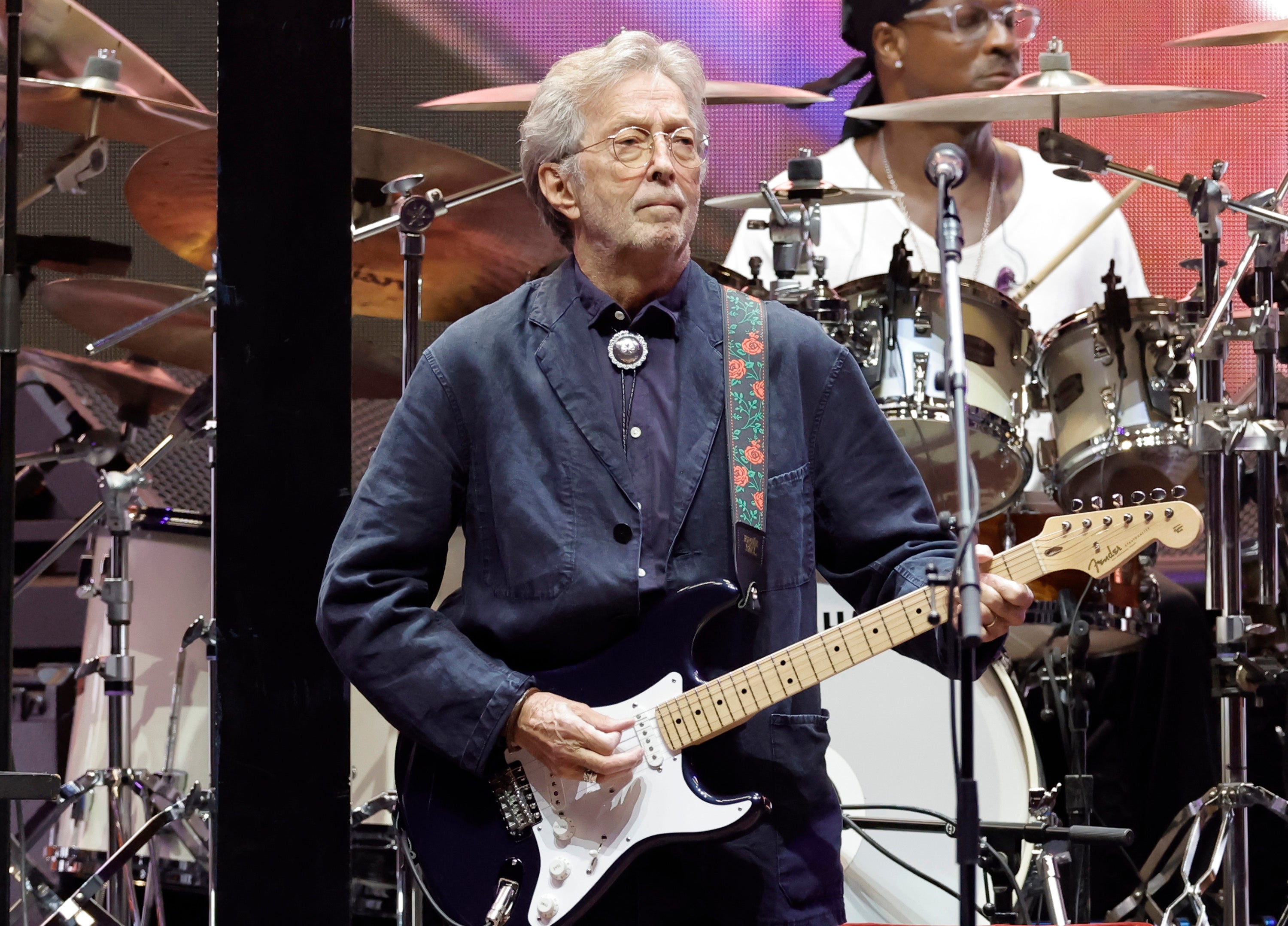 Eric Clapton ended a concert in Madrid early after being struck by an object thrown from the audience