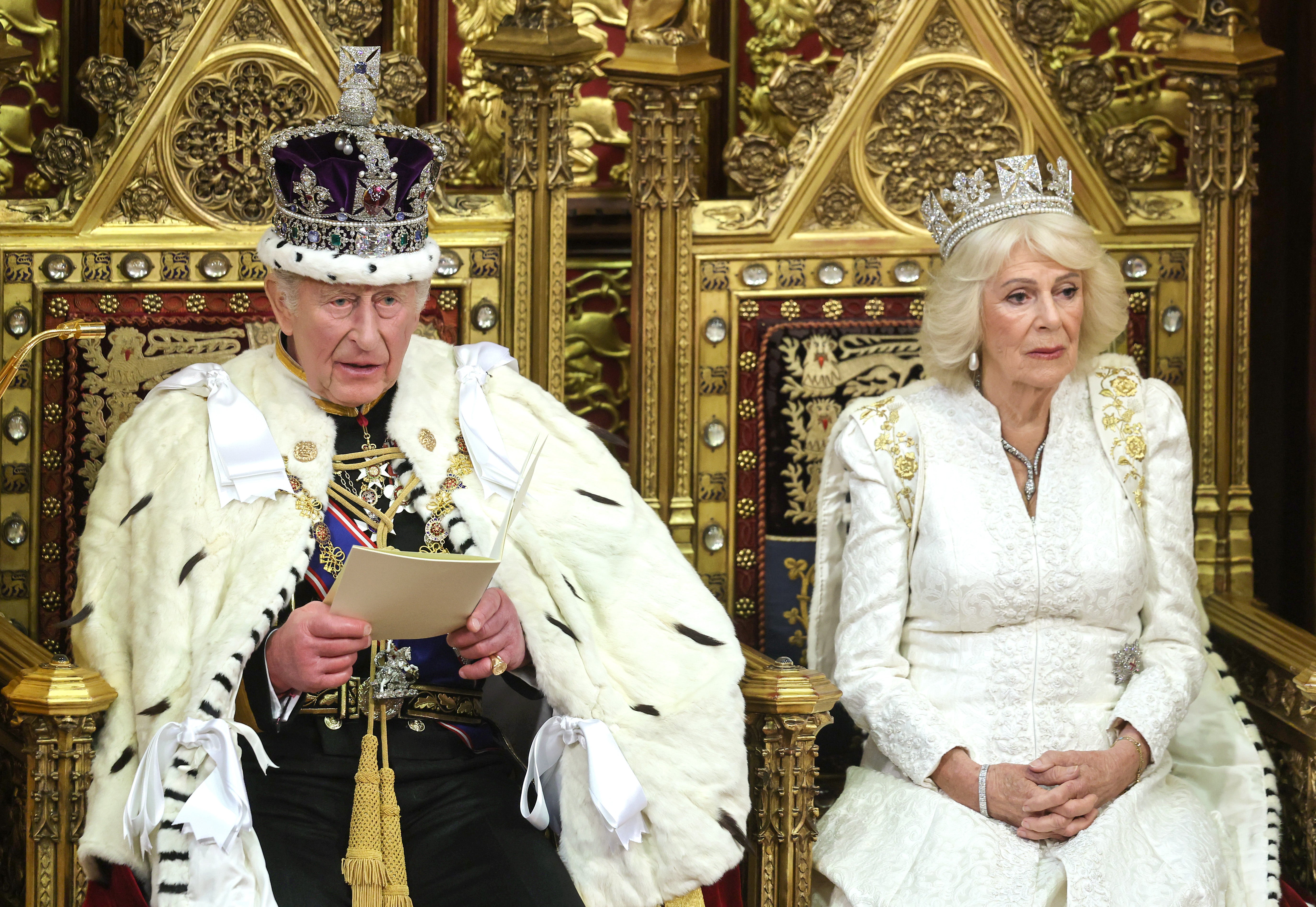 King Charles III, accompanied by Queen Camilla, reads the King's Speech in the Chamber of the House of Lords