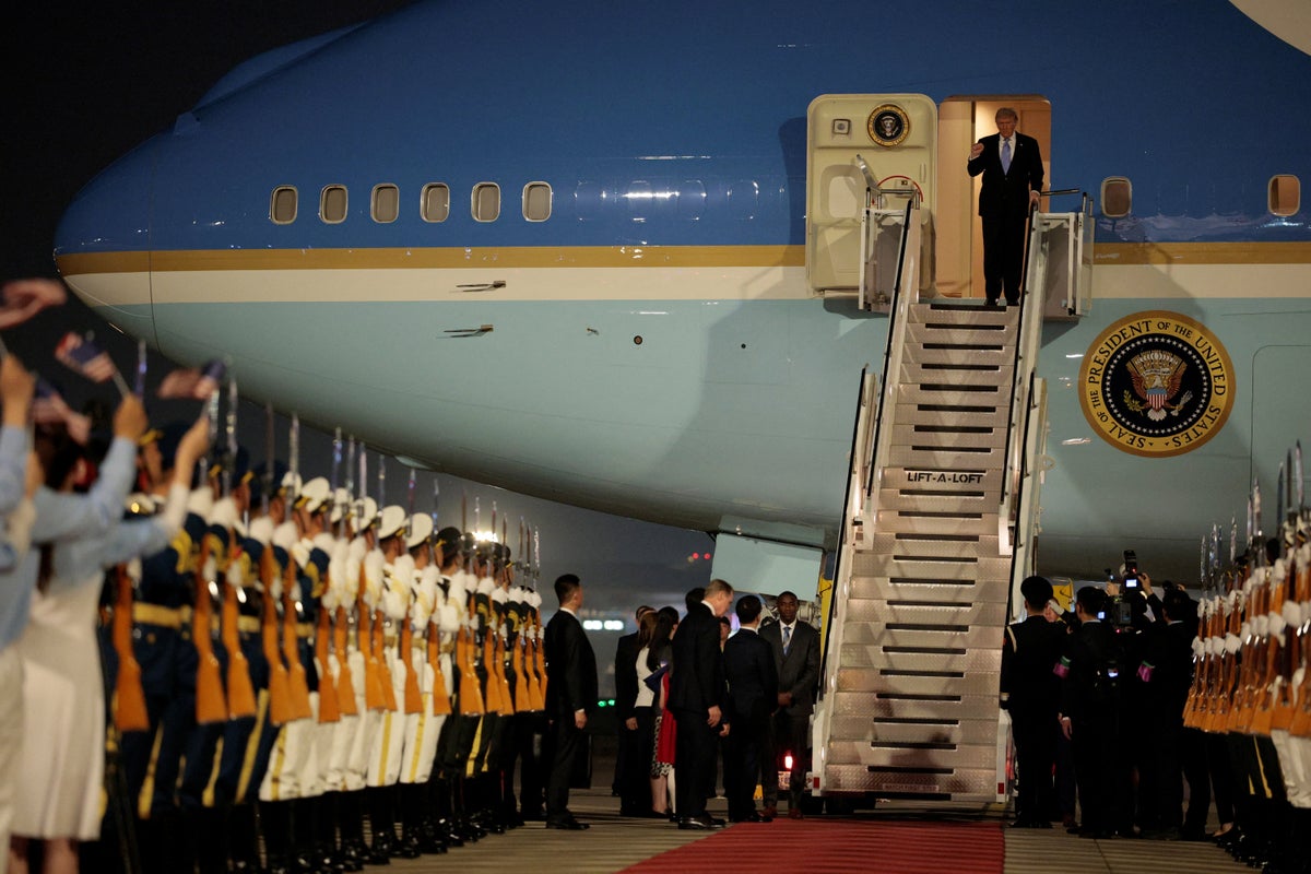 https://static.independent.co.uk/2026/05/13/13/2026-05-13T121148Z_373791334_RC2C8LAVWX8Z_RTRMADP_3_CHINA-USA-TRUMP-ARRIVAL.jpg?width=1200&height=800&crop=1200:800