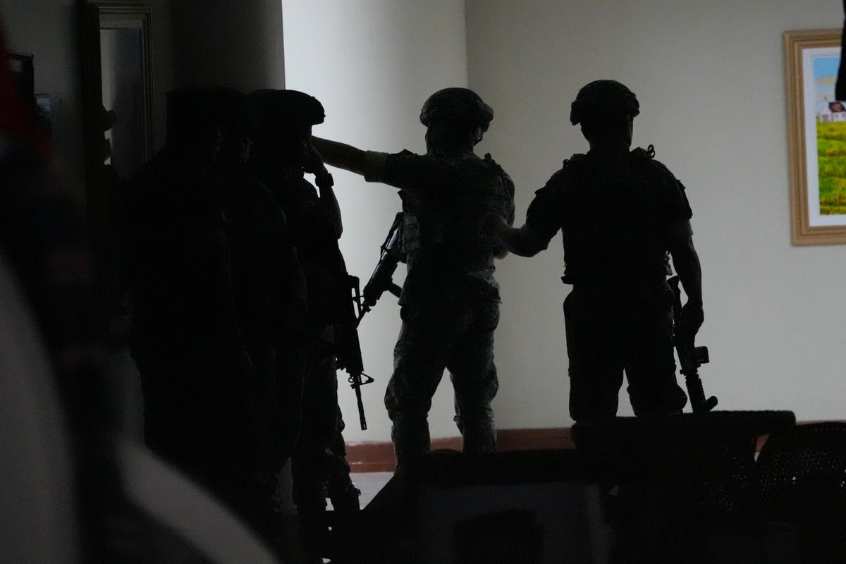 Gunfire breaks out in Philippine Senate where authorities have tried to arrest a senator