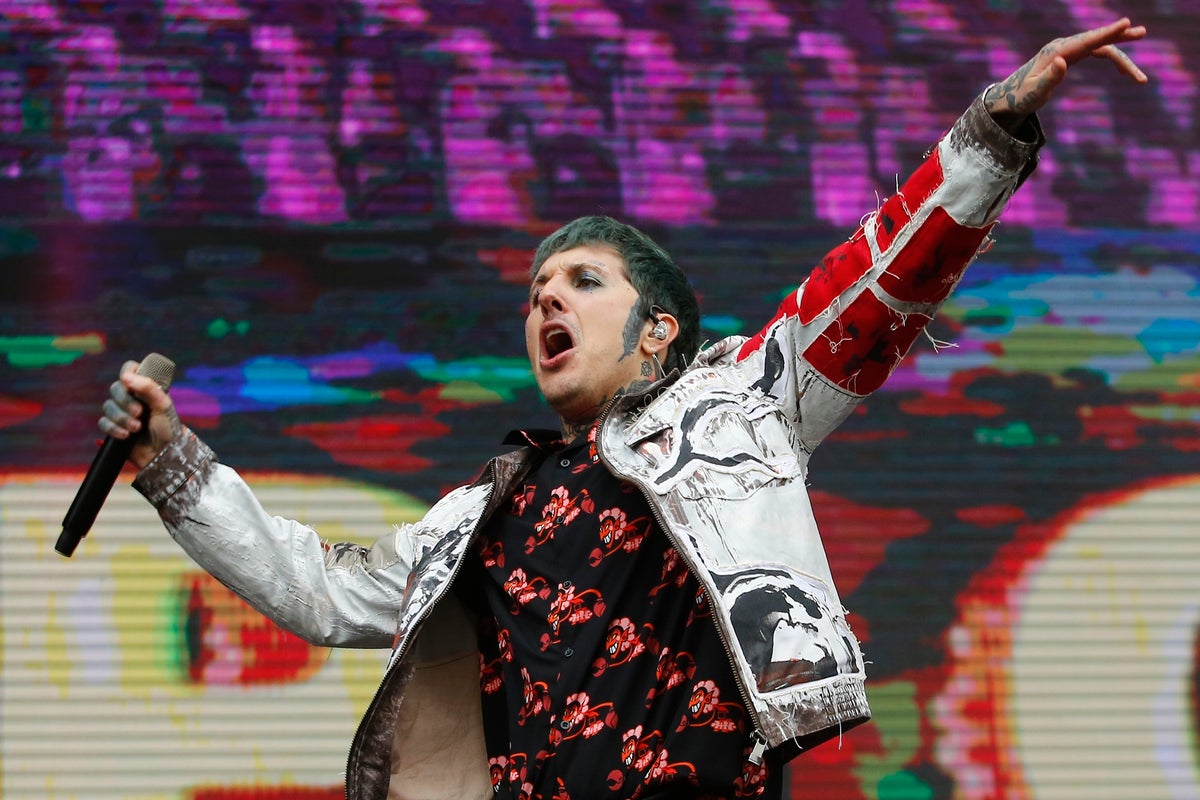 Bring Me the Horizon frontman suffers concussion after being struck by phone mid-show