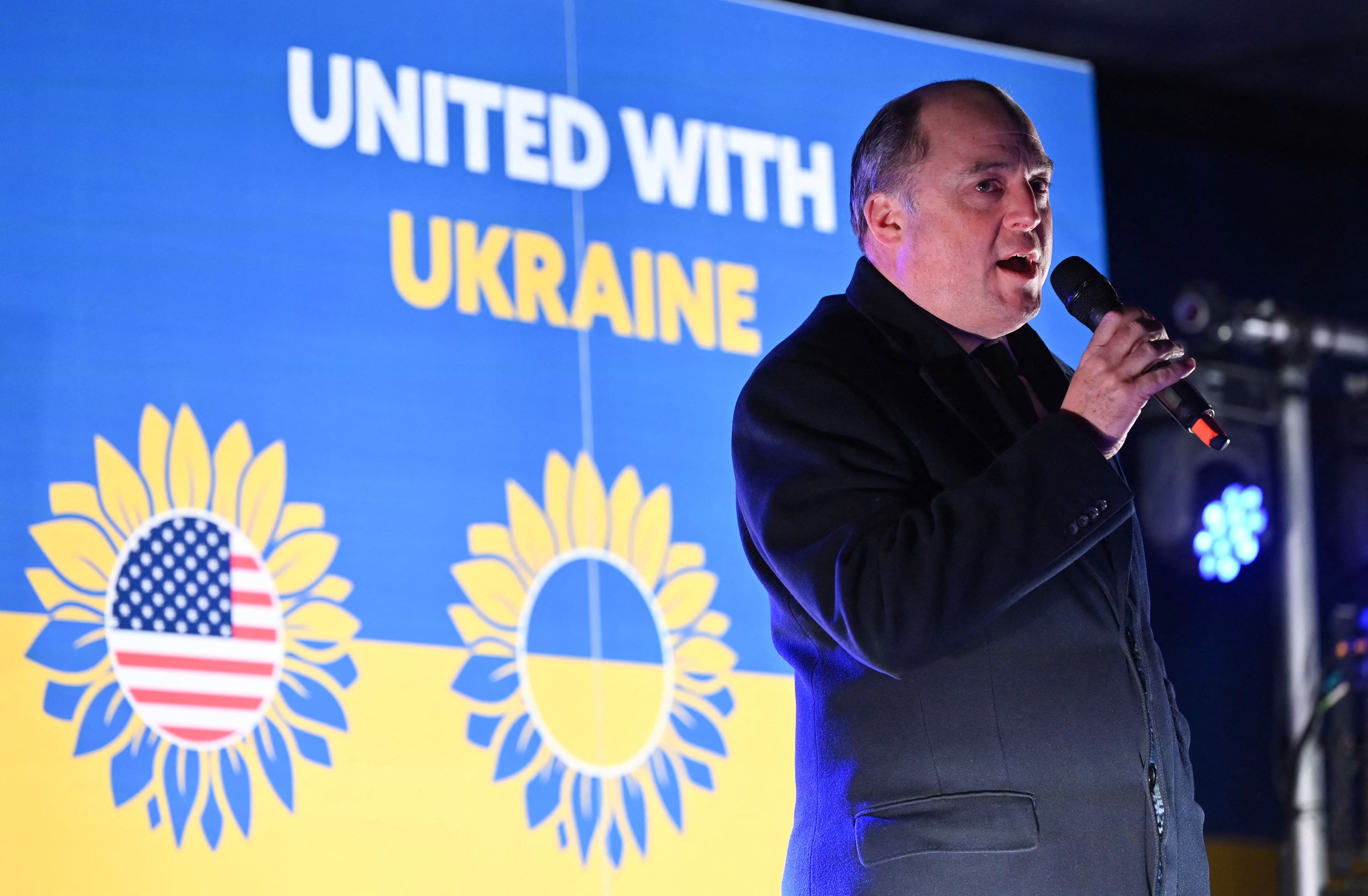 Defence Secretary Ben Wallace delivers a speech on stage during a vigil in Trafalgar Square, central London, on 23 February, 2023, to mark one year anniversary of Russia's invasion of Ukraine