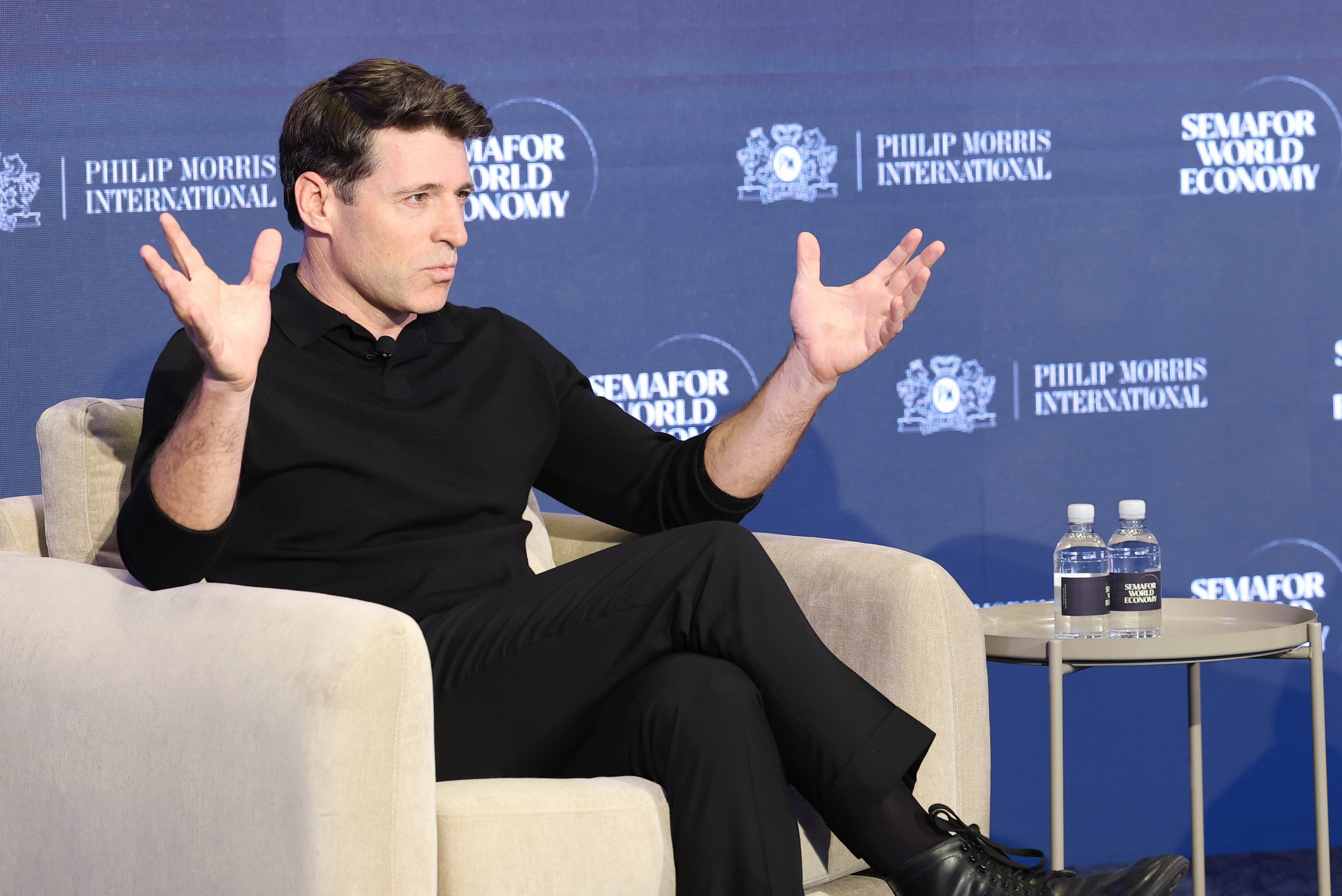 'CBS Evening News' anchor Tony Dokoupil, seen here speaking on stage in Washington on April 15, 2026, has been accused of being 'Trump-friendly' and 'MAGA-coded'