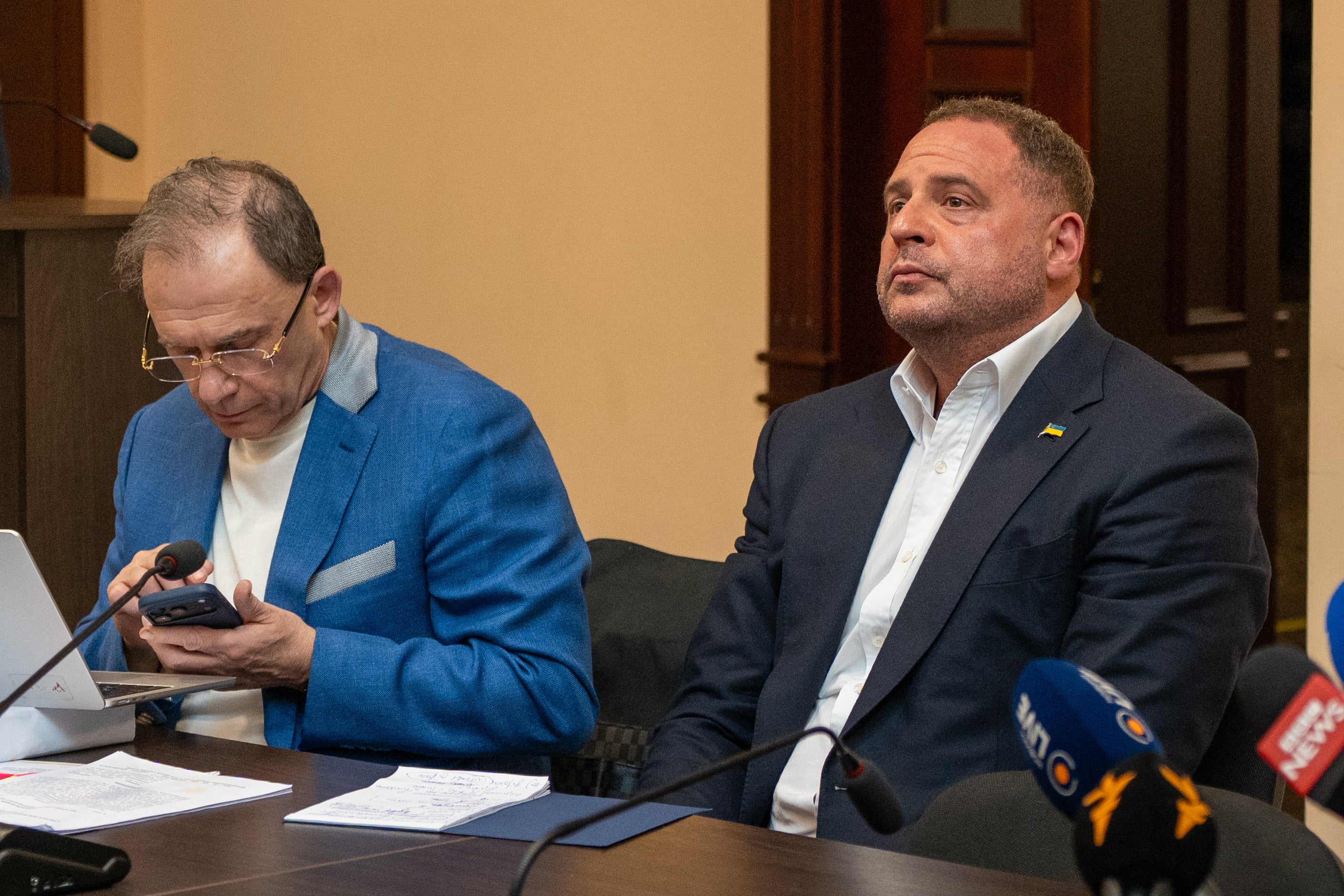 Former Ukrainian president's chief of staff, Andrii Yermak, right, is seen during a court hearing in a city court room in Kyiv, Ukraine, Tuesday, May 12, 2026. (AP Photo/Dan Bashakov)