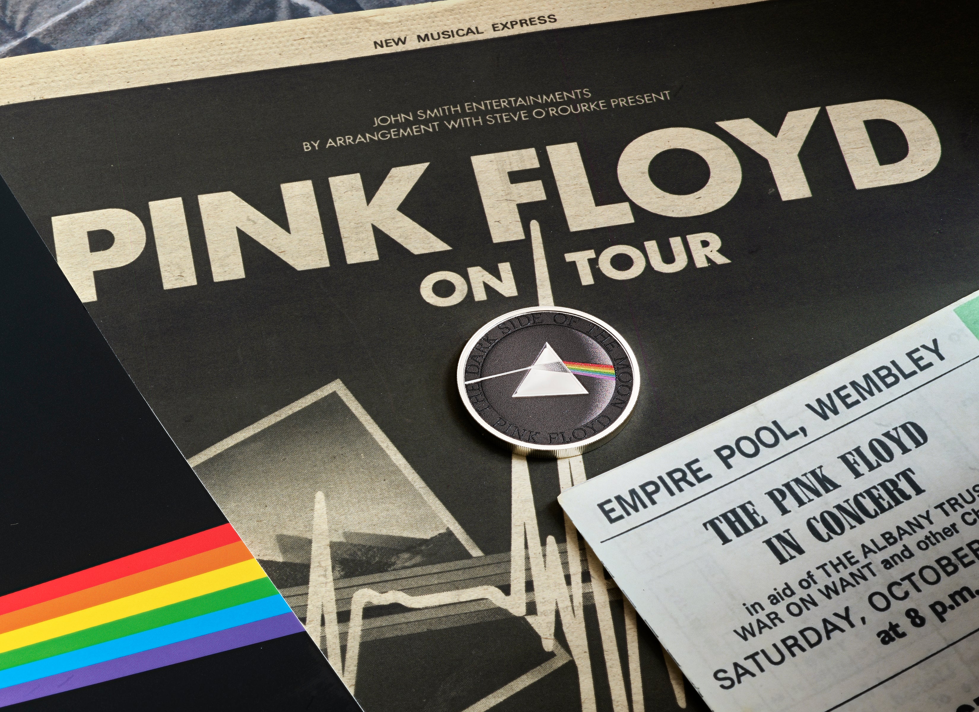 The coin features the band’s iconic prism