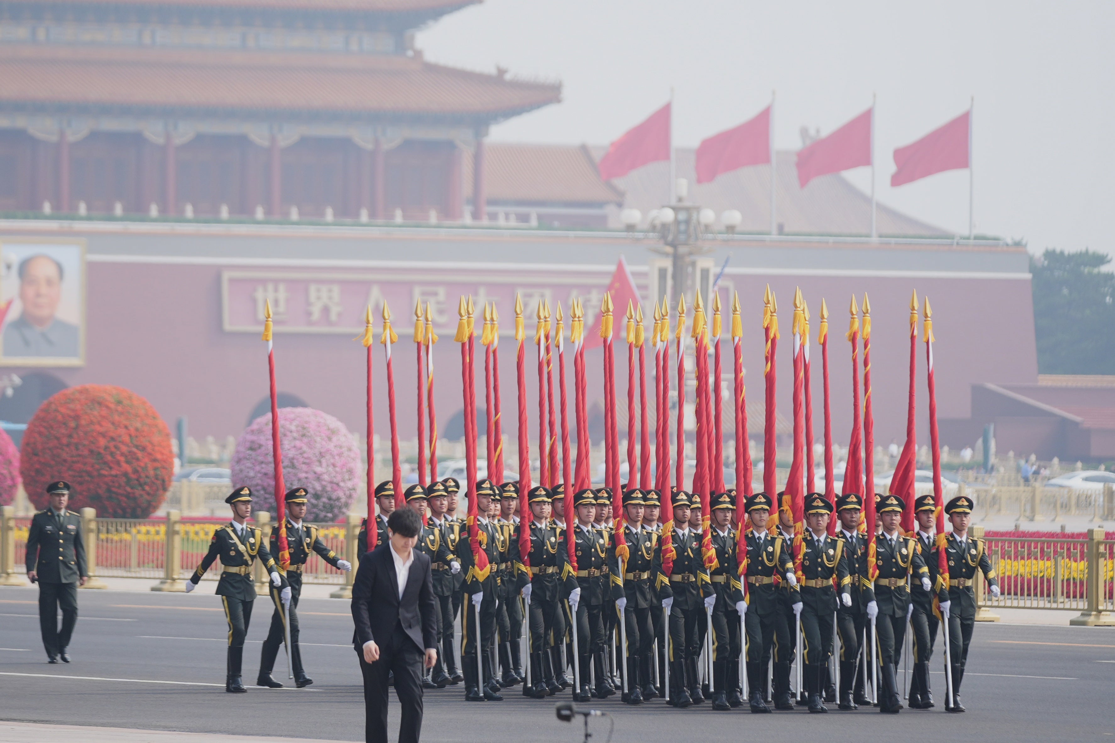Members of the military rehearse before President Donald Trump is greeted by Chinese President Xi Jinping at a welcome ceremony at the Great Hall of the People, Thursday