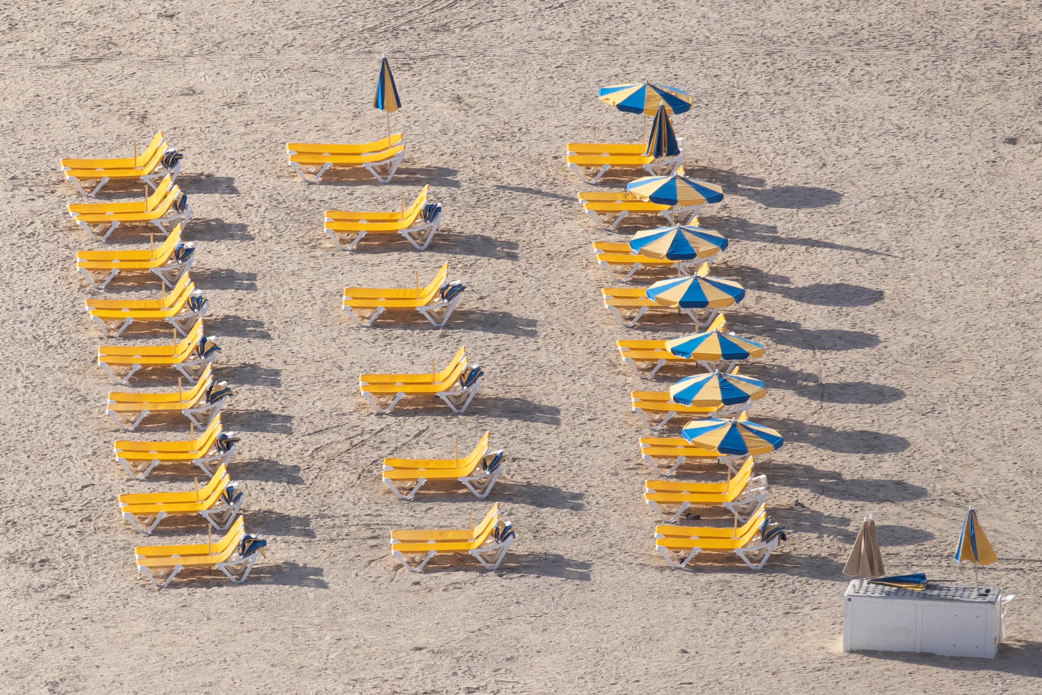 A number of sun loungers have been banned from Spanish beaches