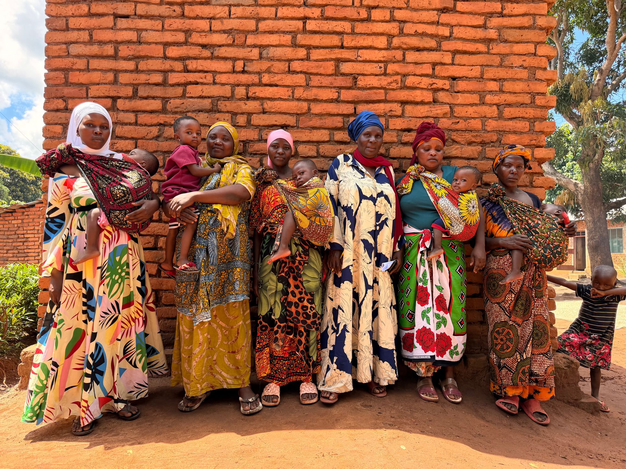 The mother and toddler nutrition group at Zombo village in the Kilosa District of Tanzania, who told The Independent that they are worried that weak harvests, which have resulted from flooding, will mean their children may become malnourished again